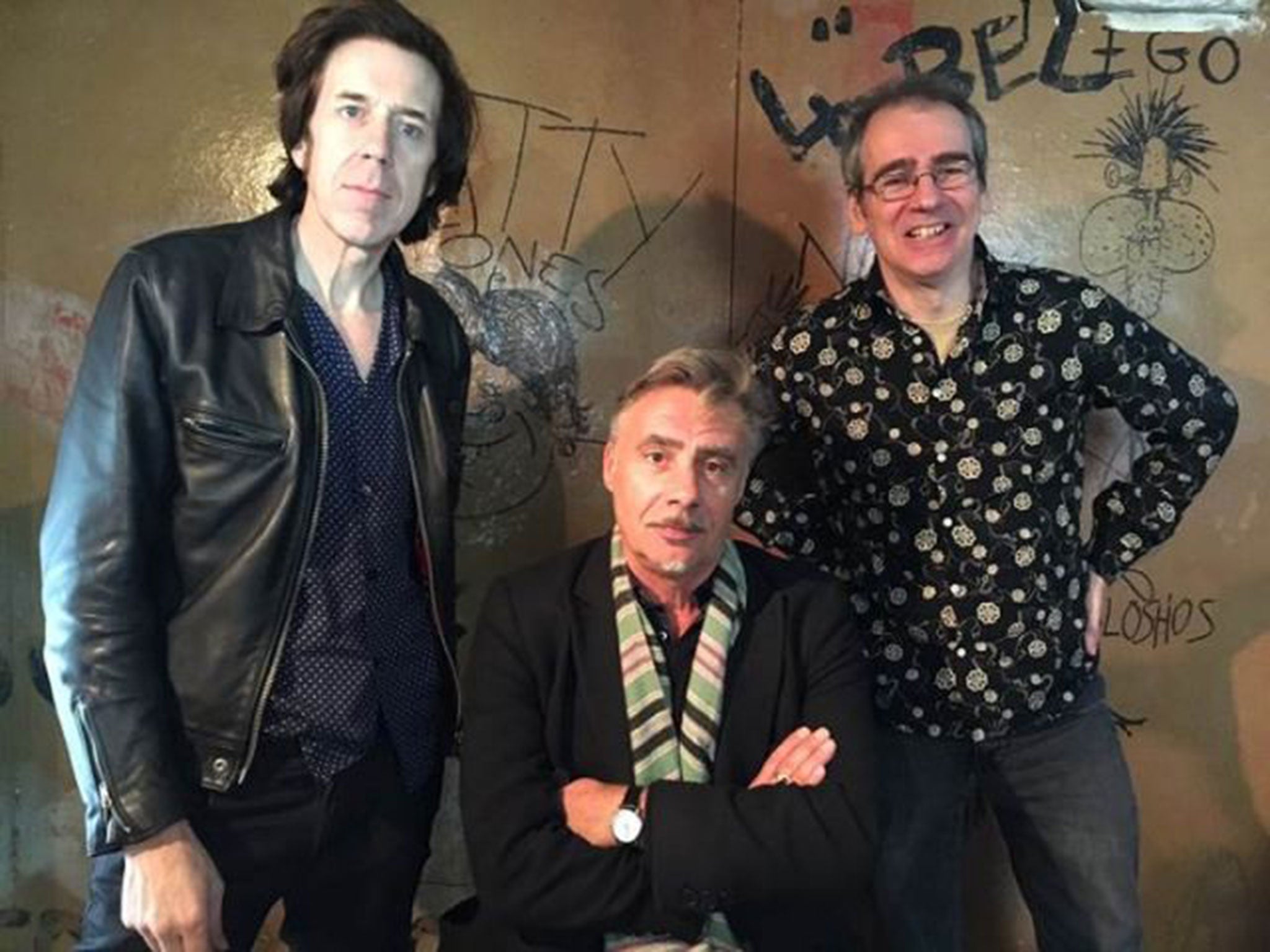 From left: Rupert Orton of The Jim Jones Revue, the Sex Pistols’ Glen Matlock and Henry Scott-Irvine of the Save Tin Pan Alley Campaign, by the Malcolm ‘Muggeridge’ McLaren cartoon