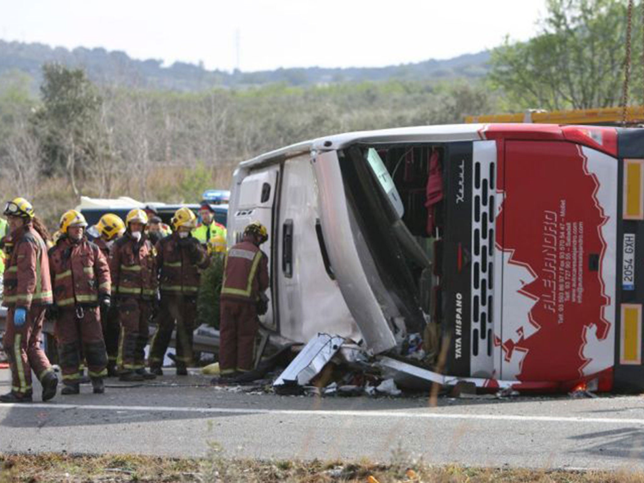 &#13;
The coach overturned on a motorway in Freginals, in the province of Tarragona, north-eastern Spain &#13;