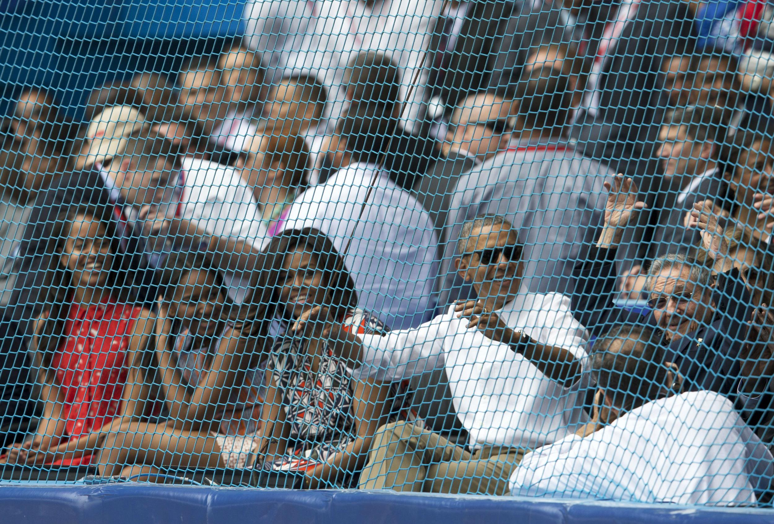 Barack Obama joined 55,000 to do the wave at a baseball game