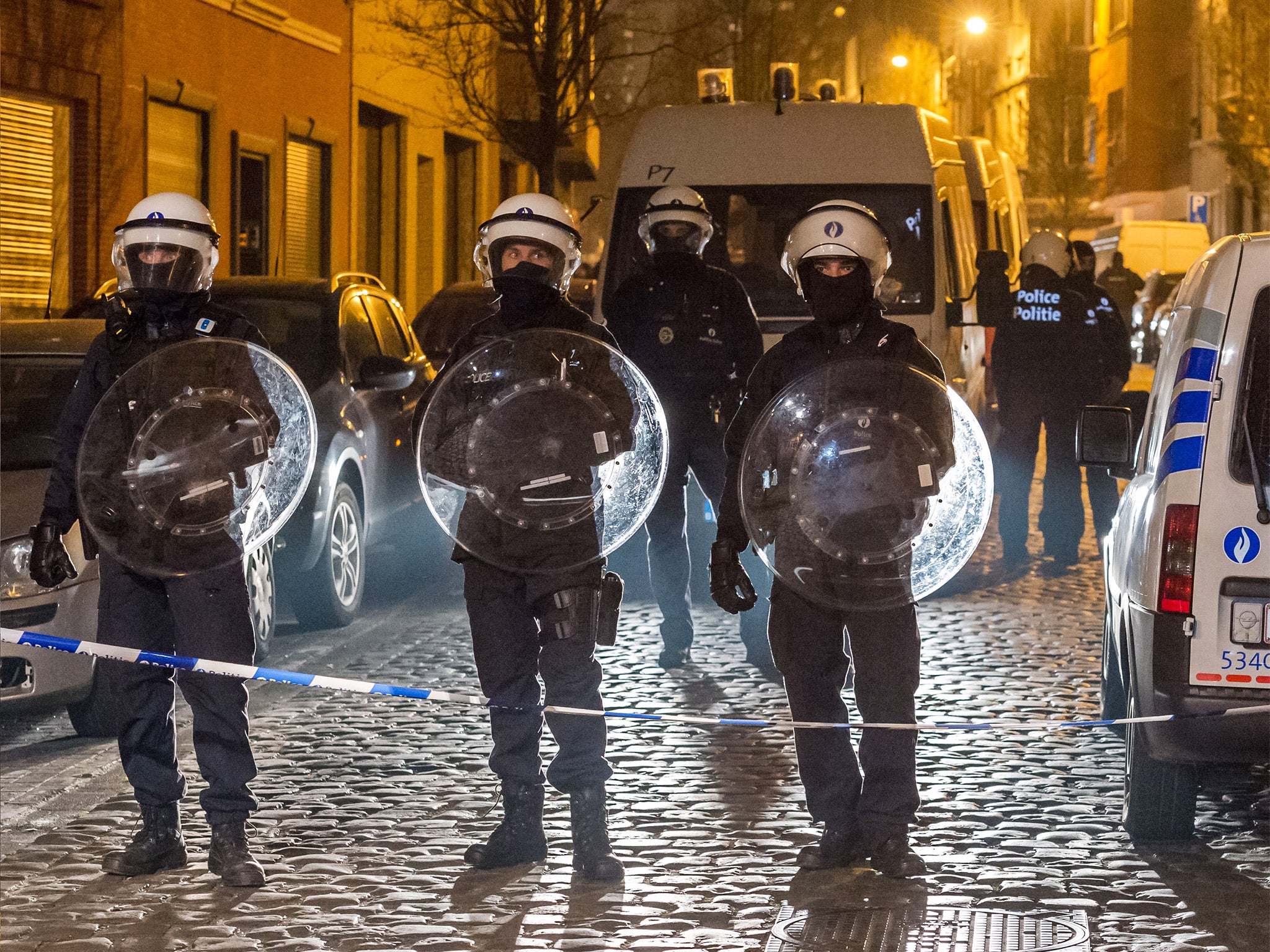 &#13;
Police officers in Molenbeek last week, following Salah Abdeslam's capture &#13;