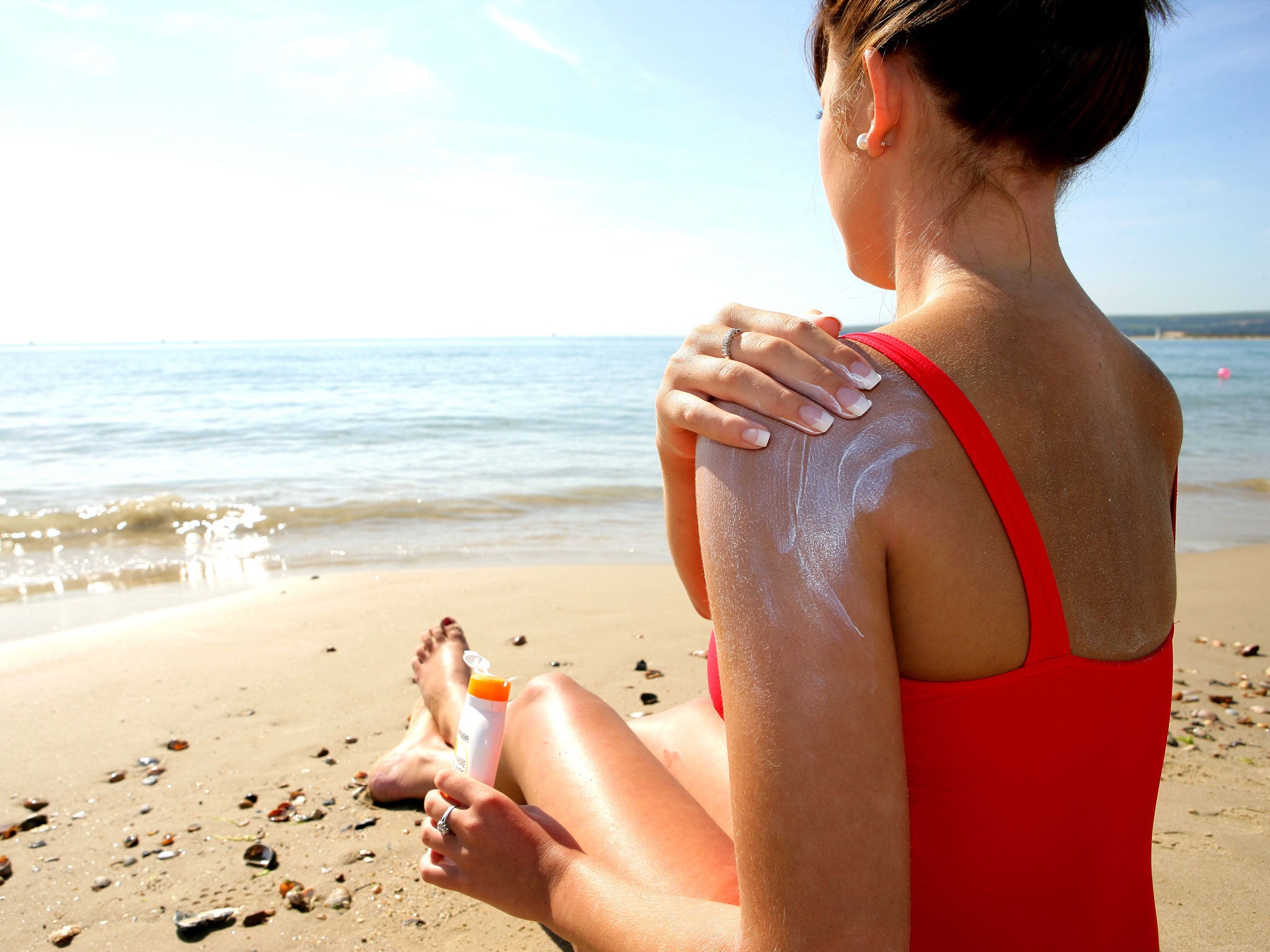 Dermatologists have warned people must regularly re-apply sunscreen to ensure long-lasting protection, despite some product claims