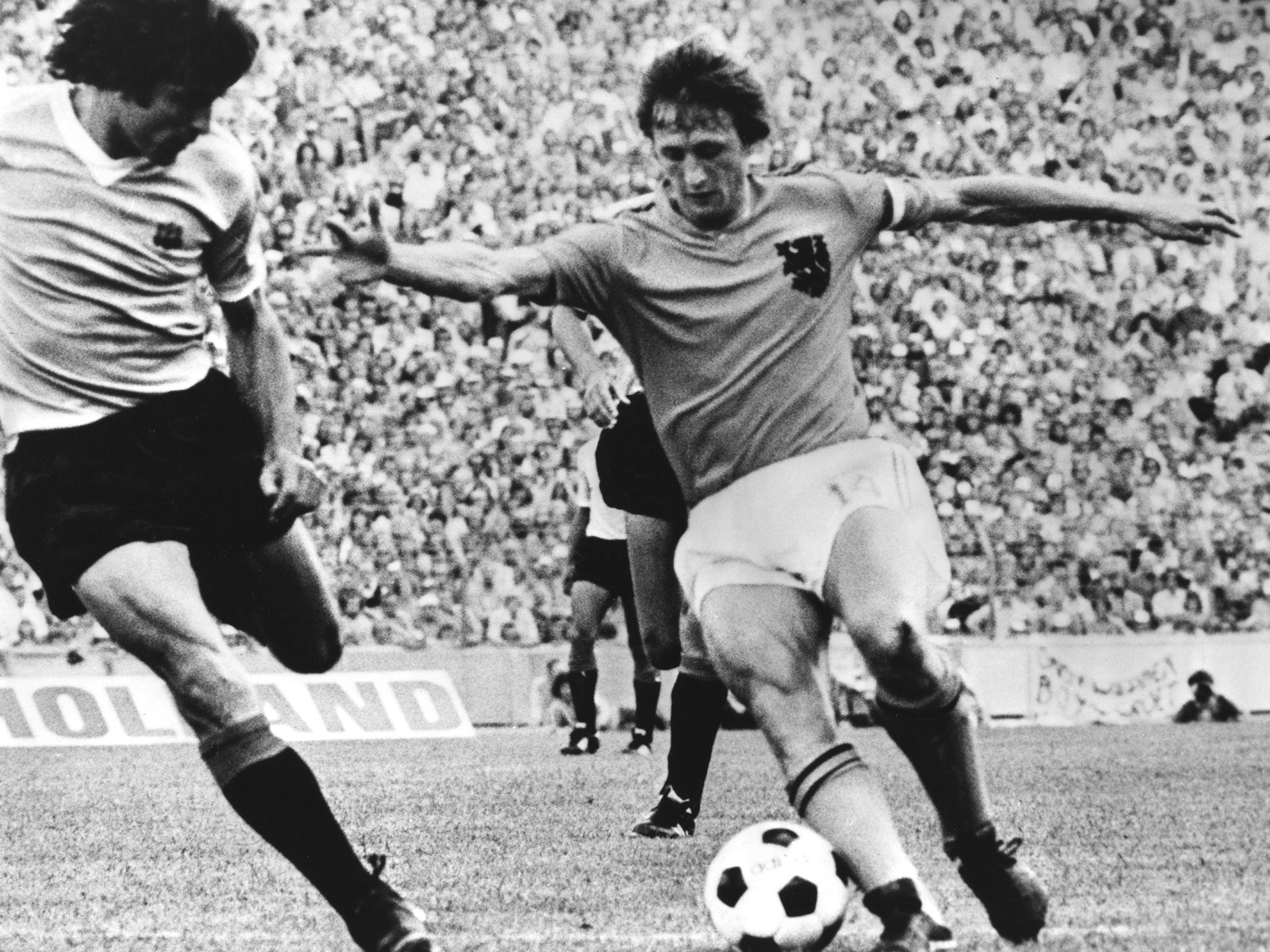 Cruyff skips in and out of a defence for the Netherlands