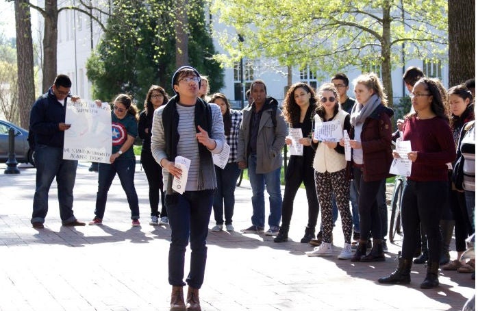 Students gather to protest against the graffiti which they see as 'intimidation'