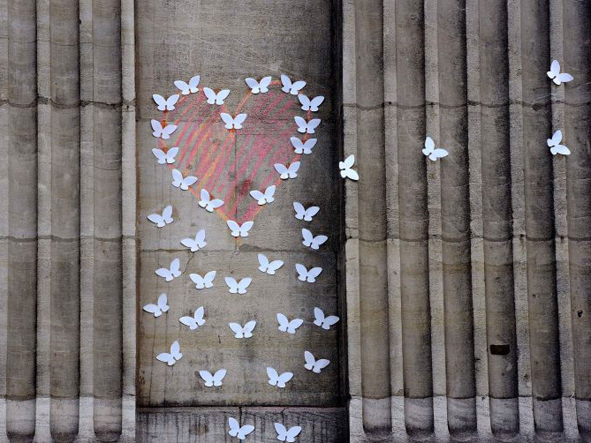 A chalk-drawn tribute to the victims of the attack on a wall on the Place de la Bourse (Beursplein) in central Brussels