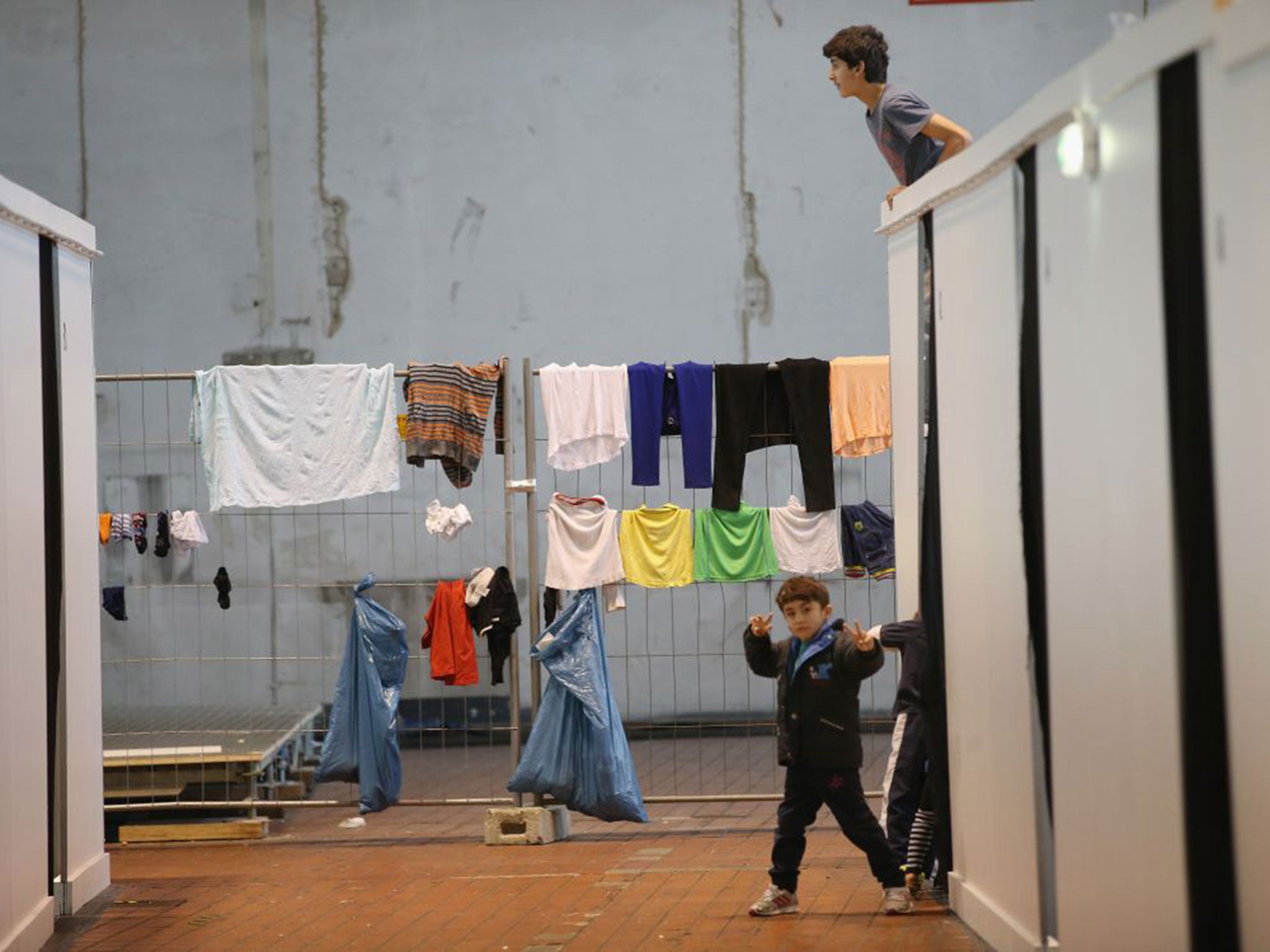 Tempelhof, built in the 1930s, houses more than 2,000 refugees in three former hangars