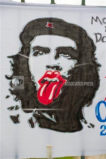Outside the venue, a mural shows the Rolling Stones' famous tongue logo added to the iconic image of Cuban revolutionary Che Guevara.