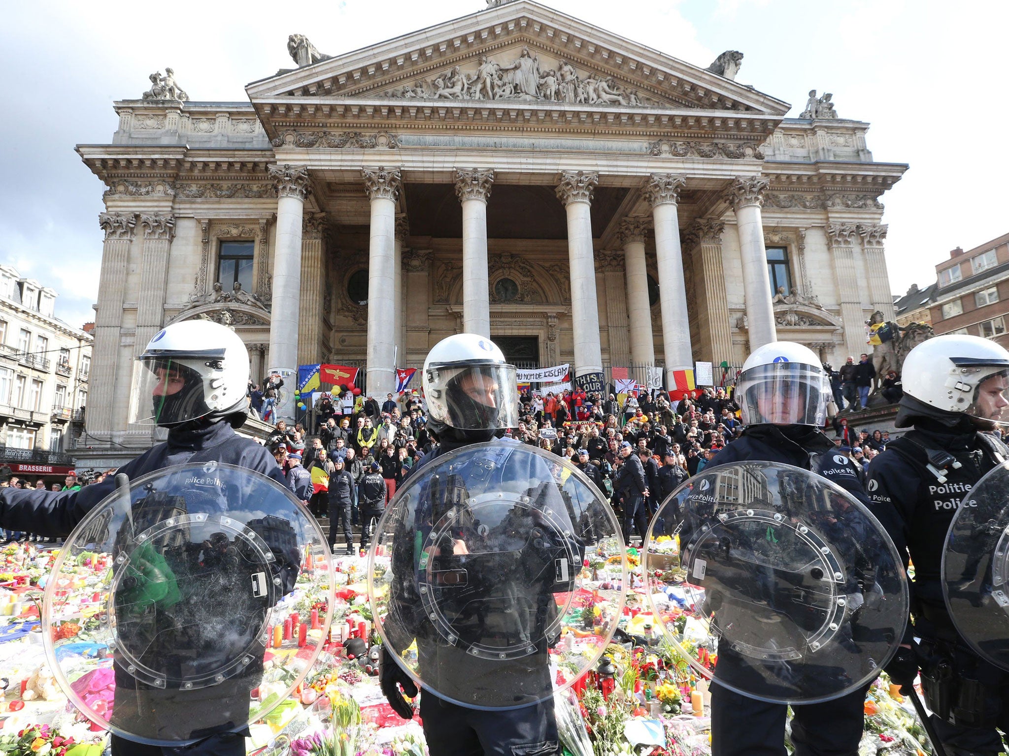 Riot police block protesters