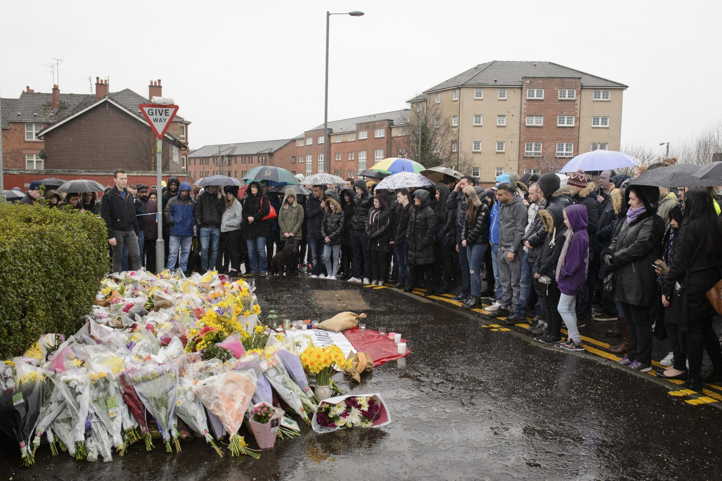 Crowds gathered to pay tribute to Mr Shah after customers and family organised a vigil