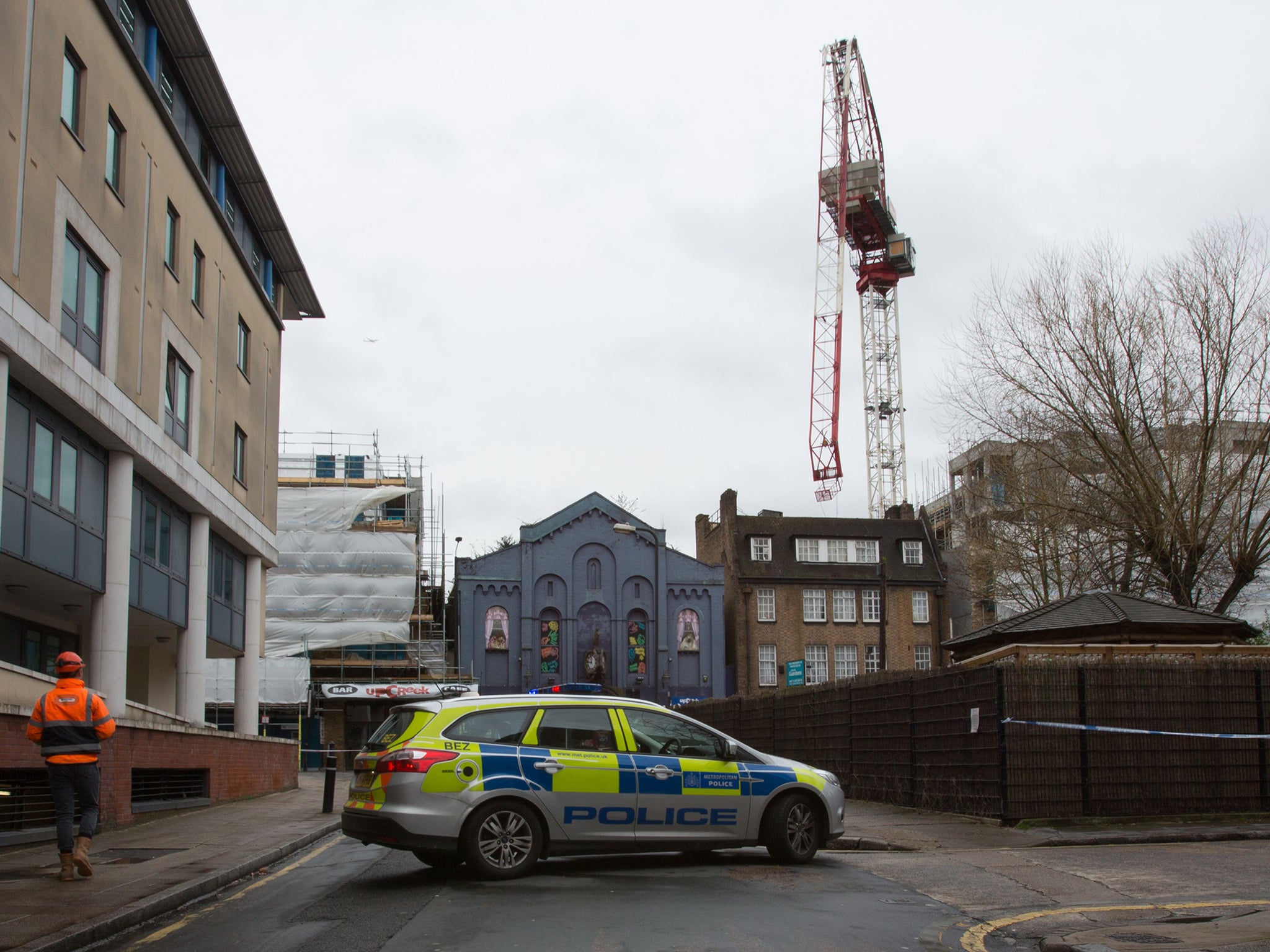 A construction crane bent overnight in high winds brought by Storm Katie in south London