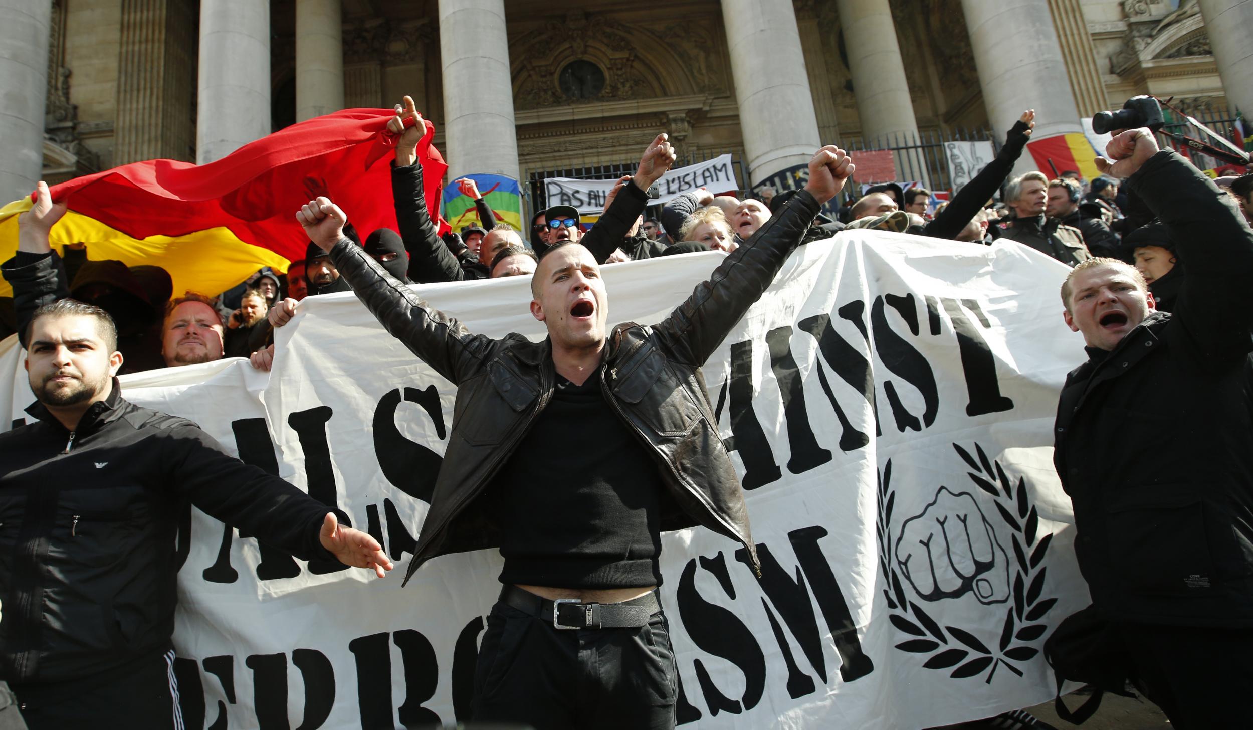 Far-right protesters stormed the peaceful gathering in the Place de la Bourse wearing balaclavas and brandishing flares