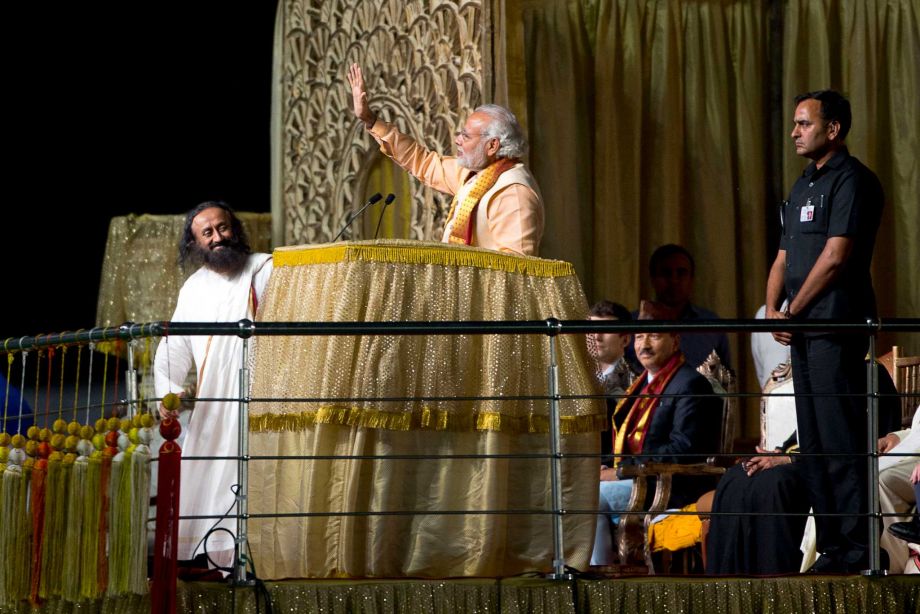 The spiritual leader was joined on stage by India's prime minister Narendra Modi