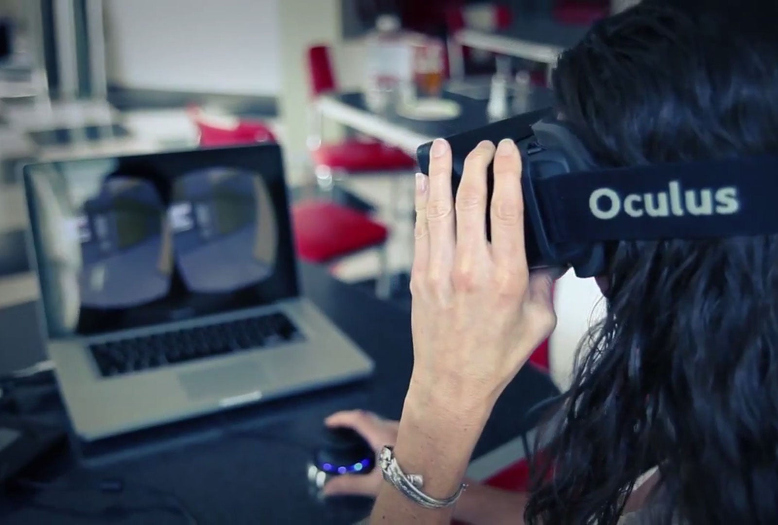 A woman takes a tour through an architectural plan using IrisVR and the Oculus Rift (IrisVR/Vimeo)