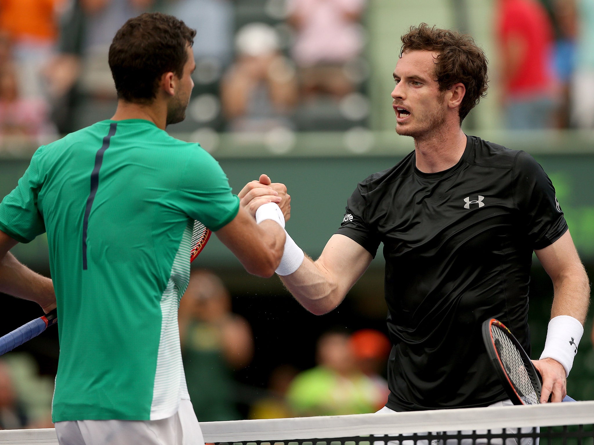 Andy Murray (right) shakes hands with Grigor Dimitrov after his Miami Open defeat