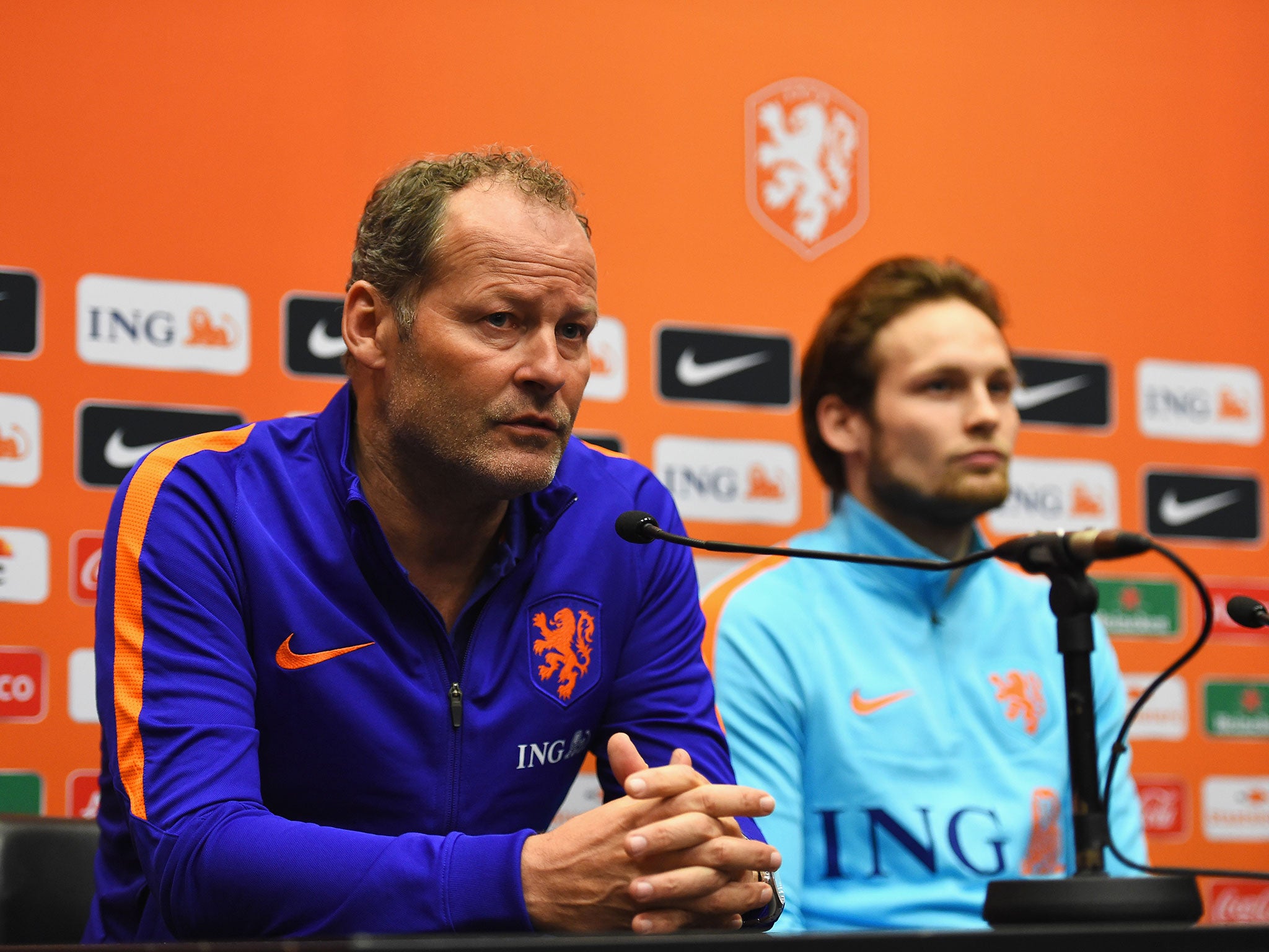 Danny Blind talks to the media alongside Daley Blind