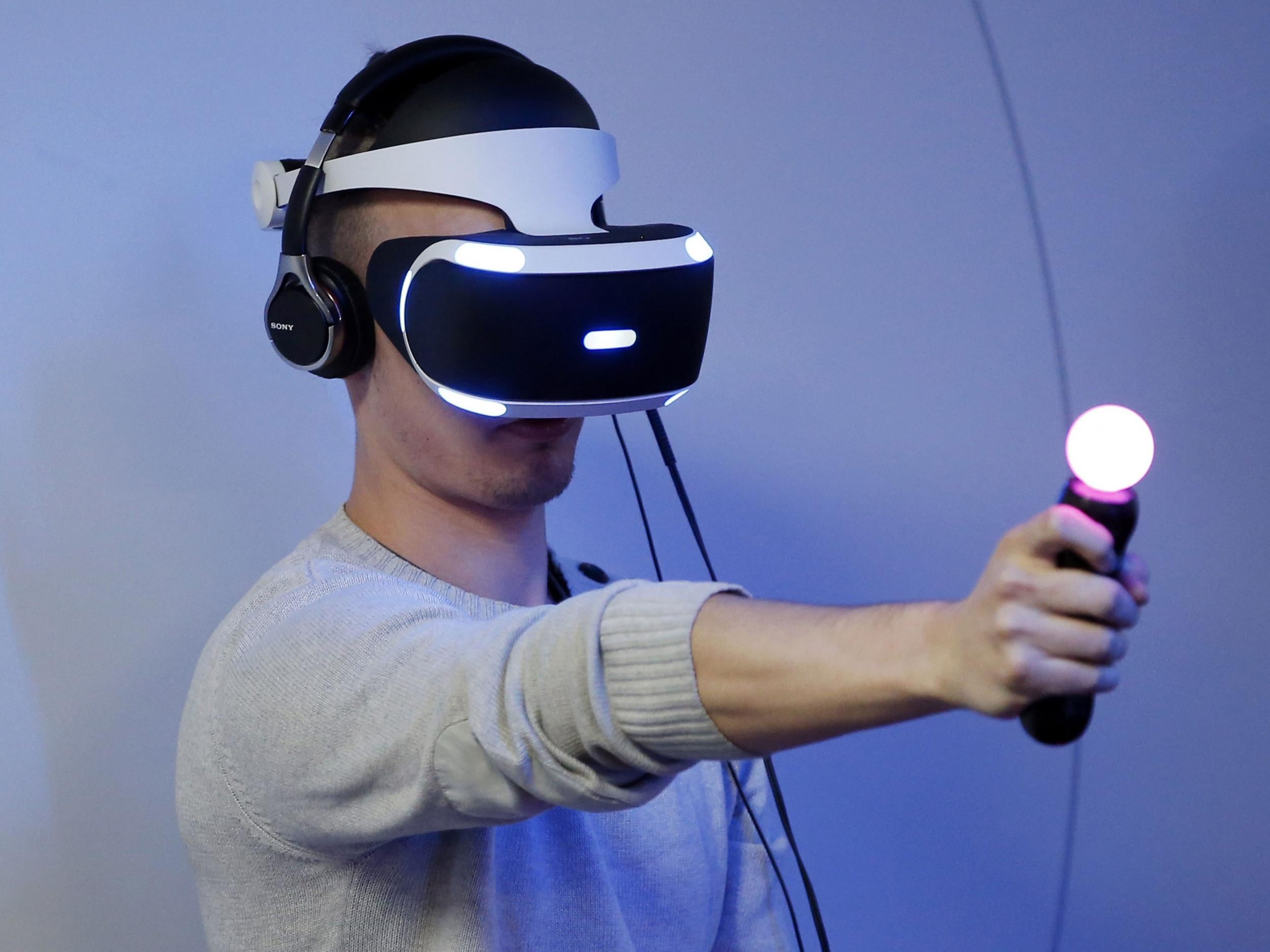 A man uses the PlayStation VR at Paris Games Week in 2015