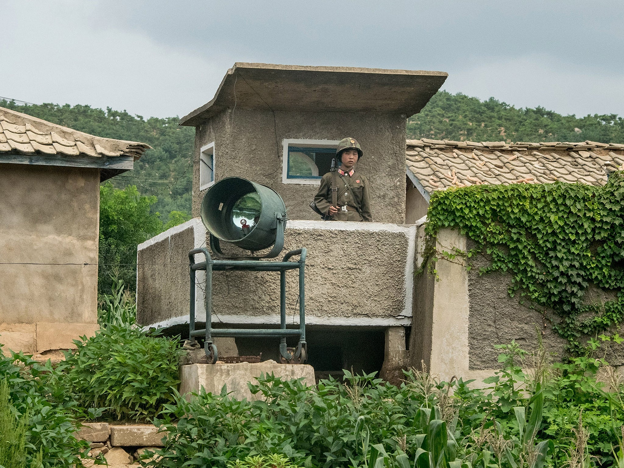 There are about 200,000 prisoners held in camps in North Korea. Here, a female soldier stands guard.