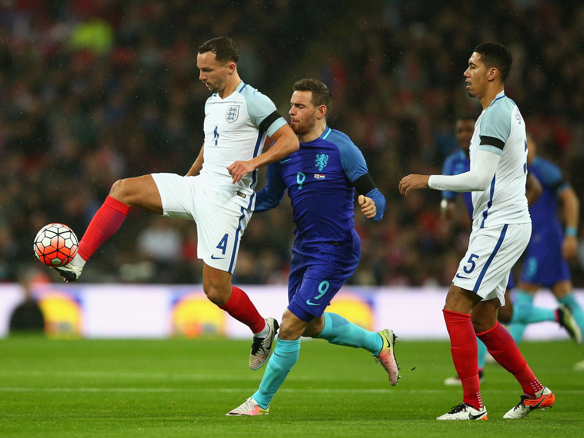 Danny Drinkwater and Chris Smalling wearing the new strip against the Netherlands