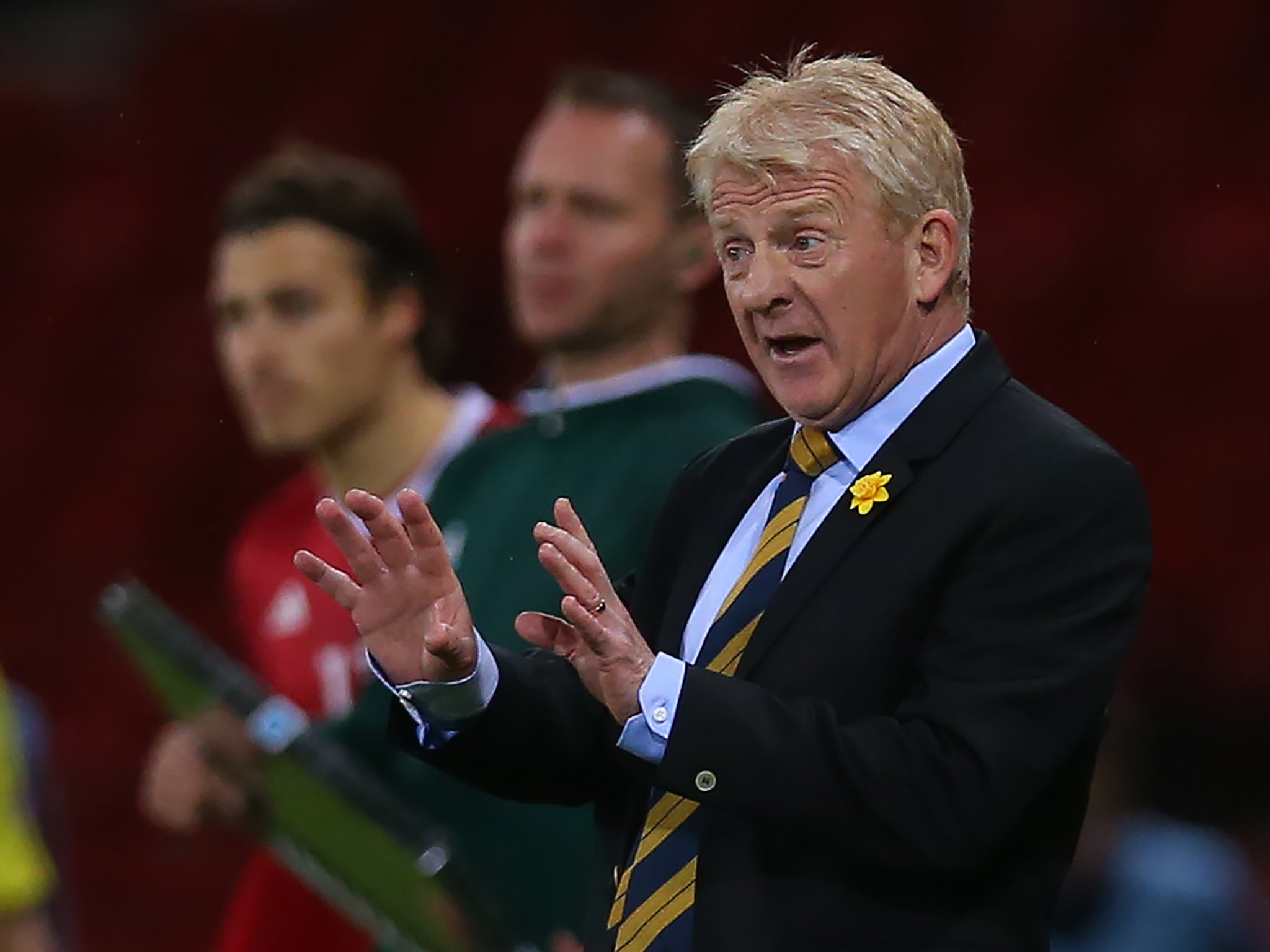 Gordon Strachan makes a gesture on the touchline