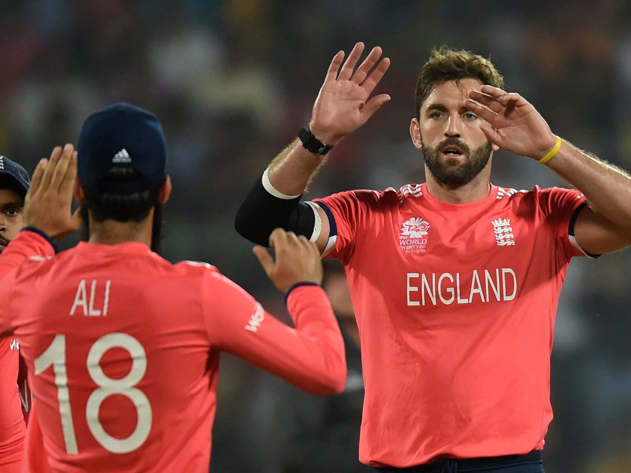 Liam Plunkett celebrates the wicket of Colin Munro