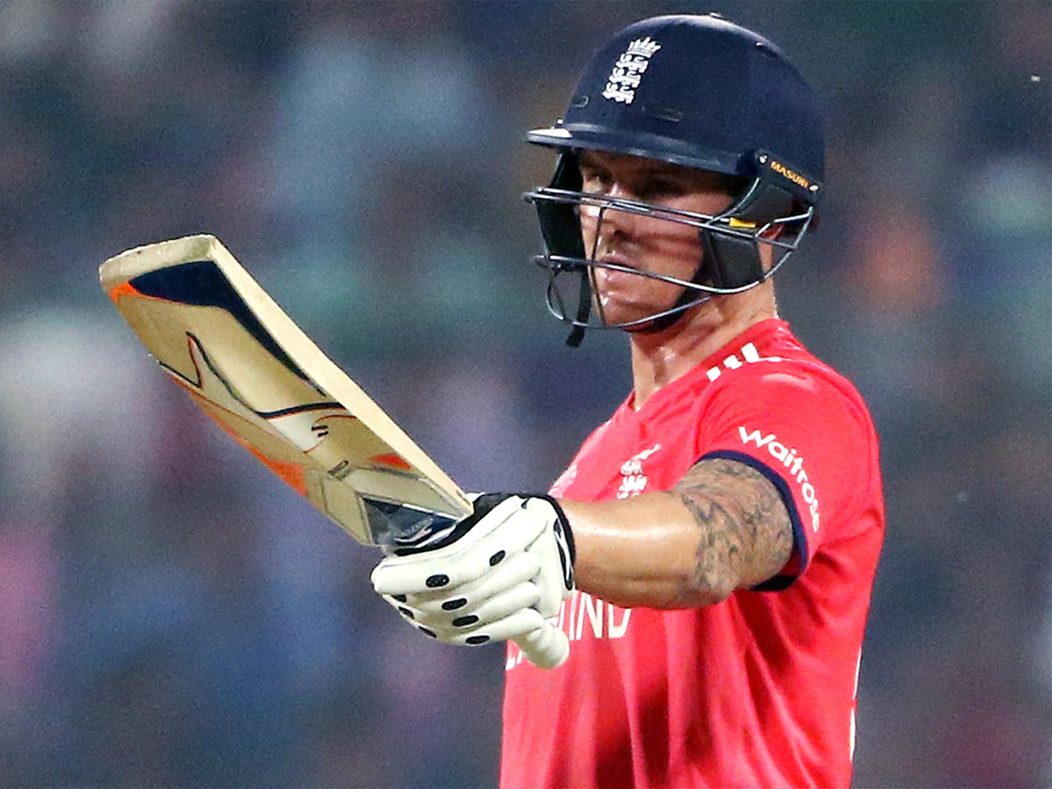 Roy waves his bat after reaching 50 runs against New Zealand