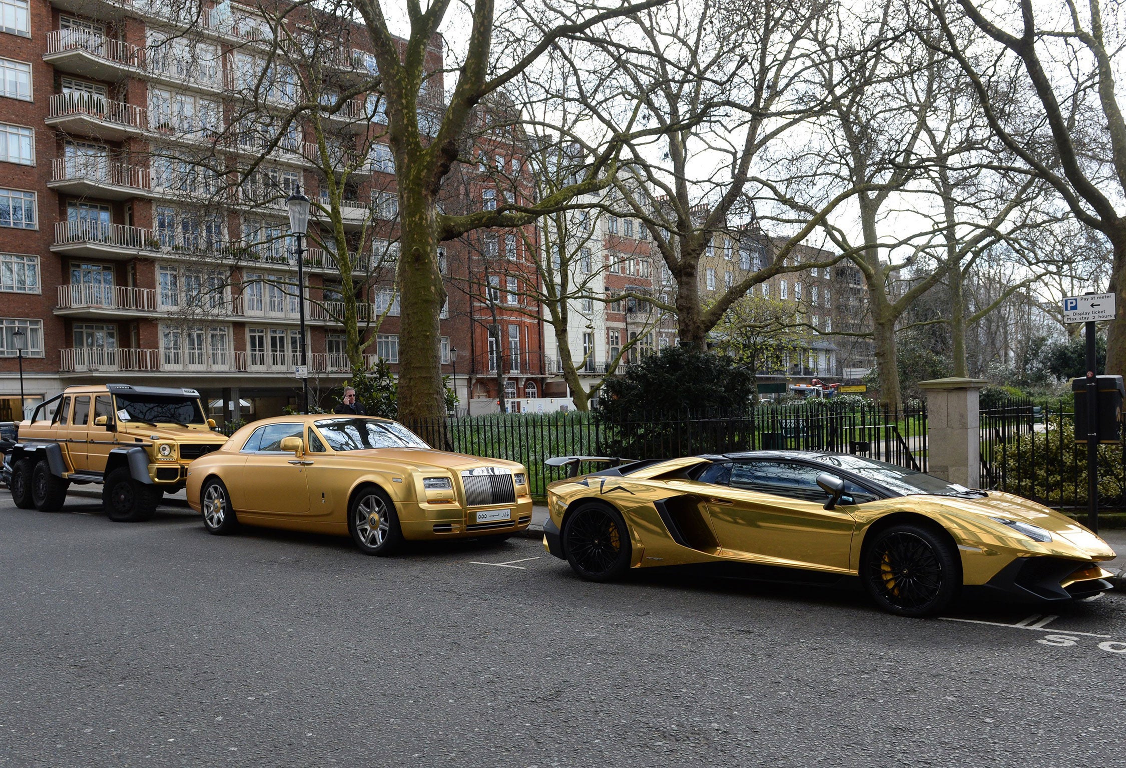 &#13;
Mercedes G 63, Rolls-Royce Phantom Coupe and Lamborghini Aventador receive parking tickets on Cadogan Place in Knightsbridge, London &#13;