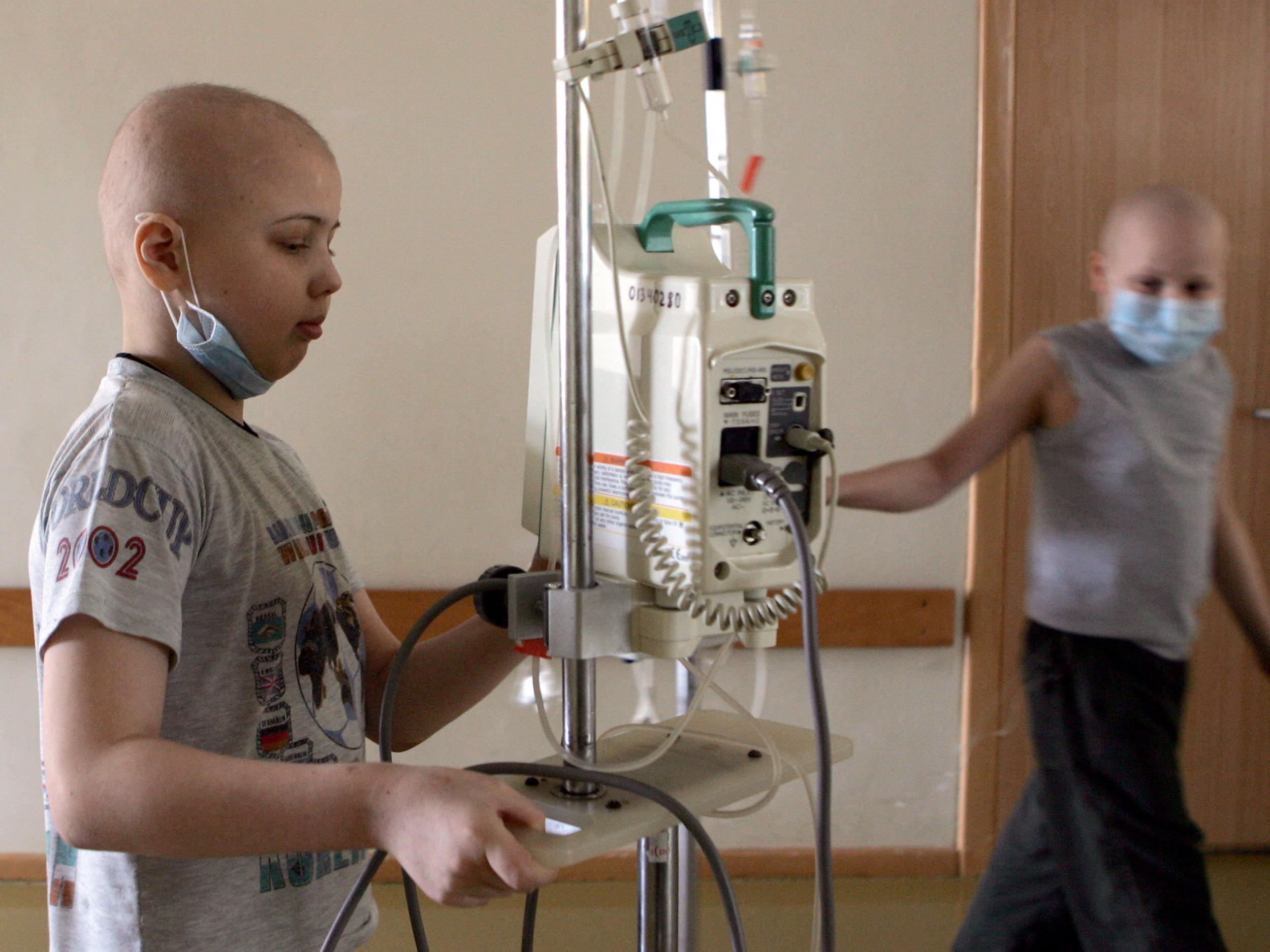 Children with lymphoma walk through the halls of a cancer hospital in Minsk, Belarus