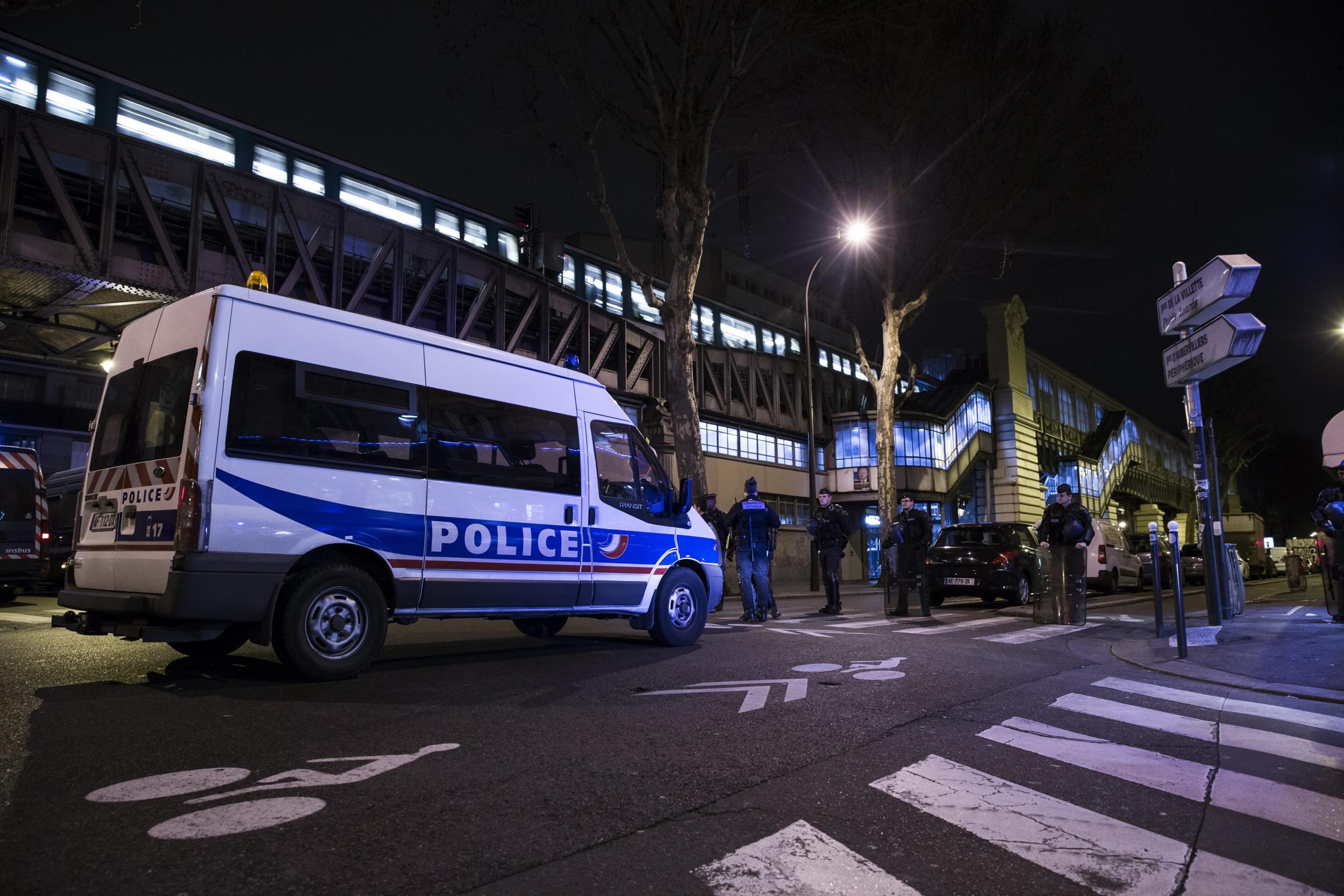 French Police standing guard outside the Stalingrad Paris Metro station