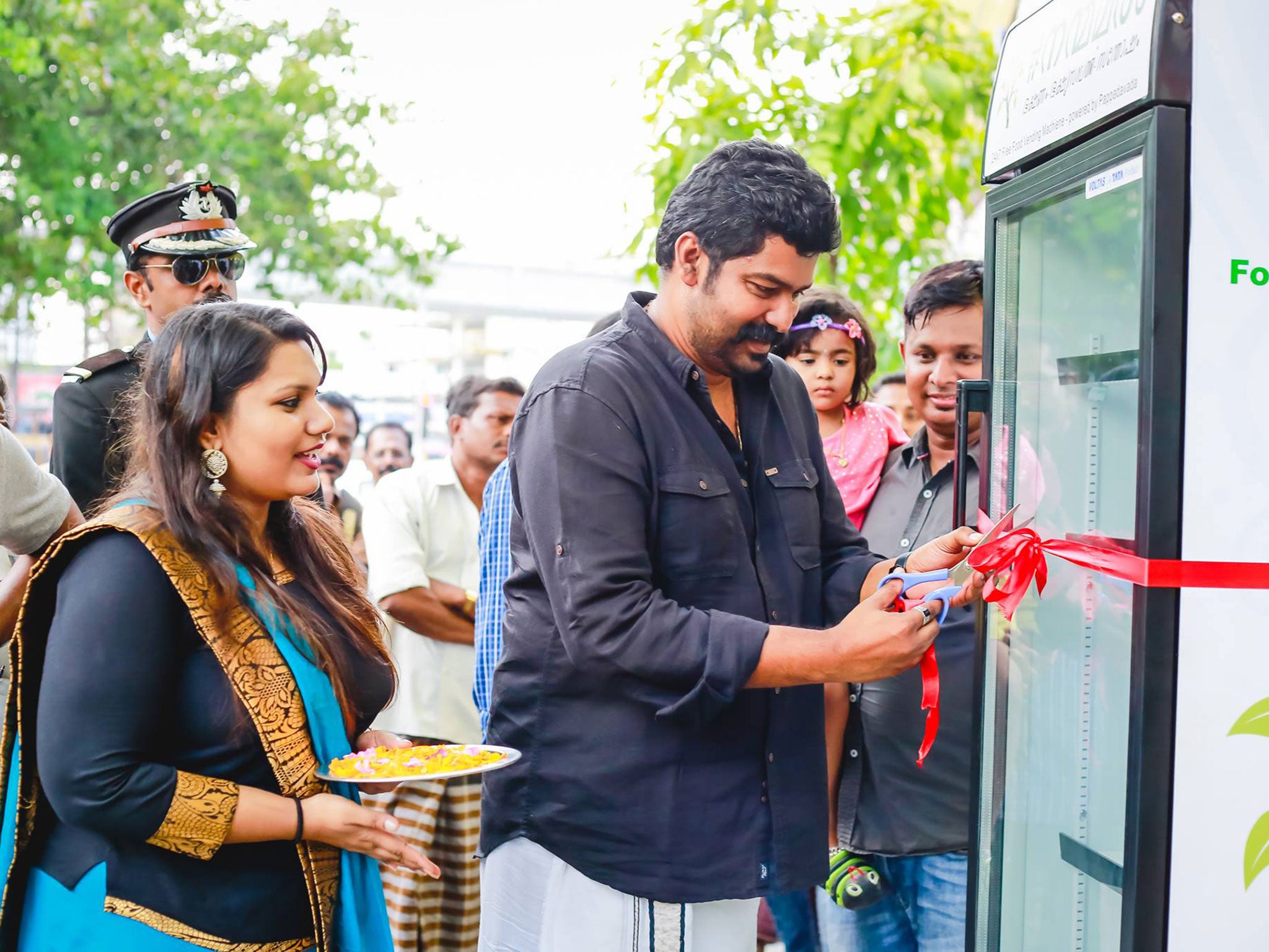 Minu Pauline, left, as the fridge is opened for use