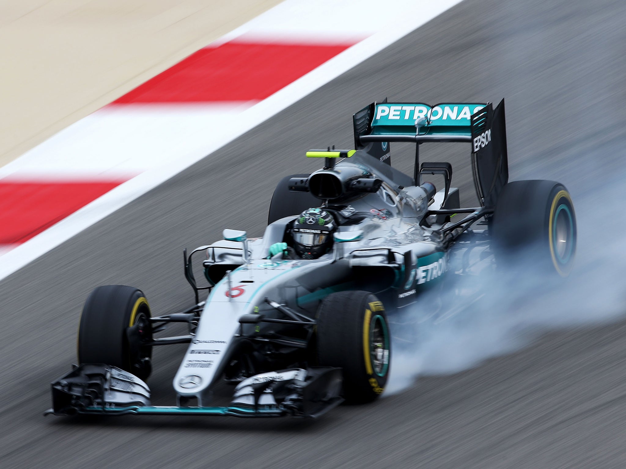 Nico Rosberg turbo locks a wheel on track during practice