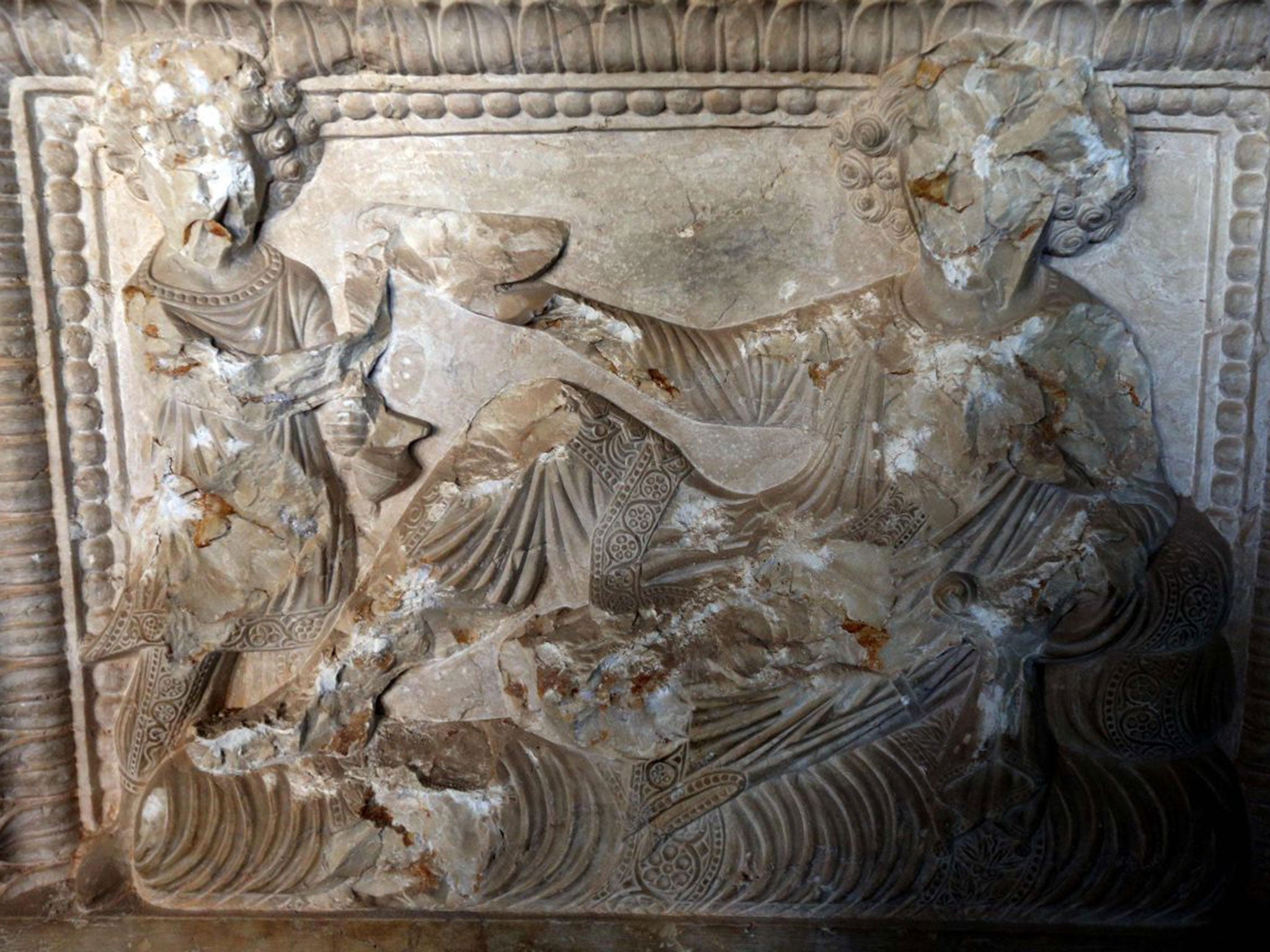 A an ancient work of art, which may have been shot at by Isis militants. (JOSEPH EID/AFP/Getty Images )