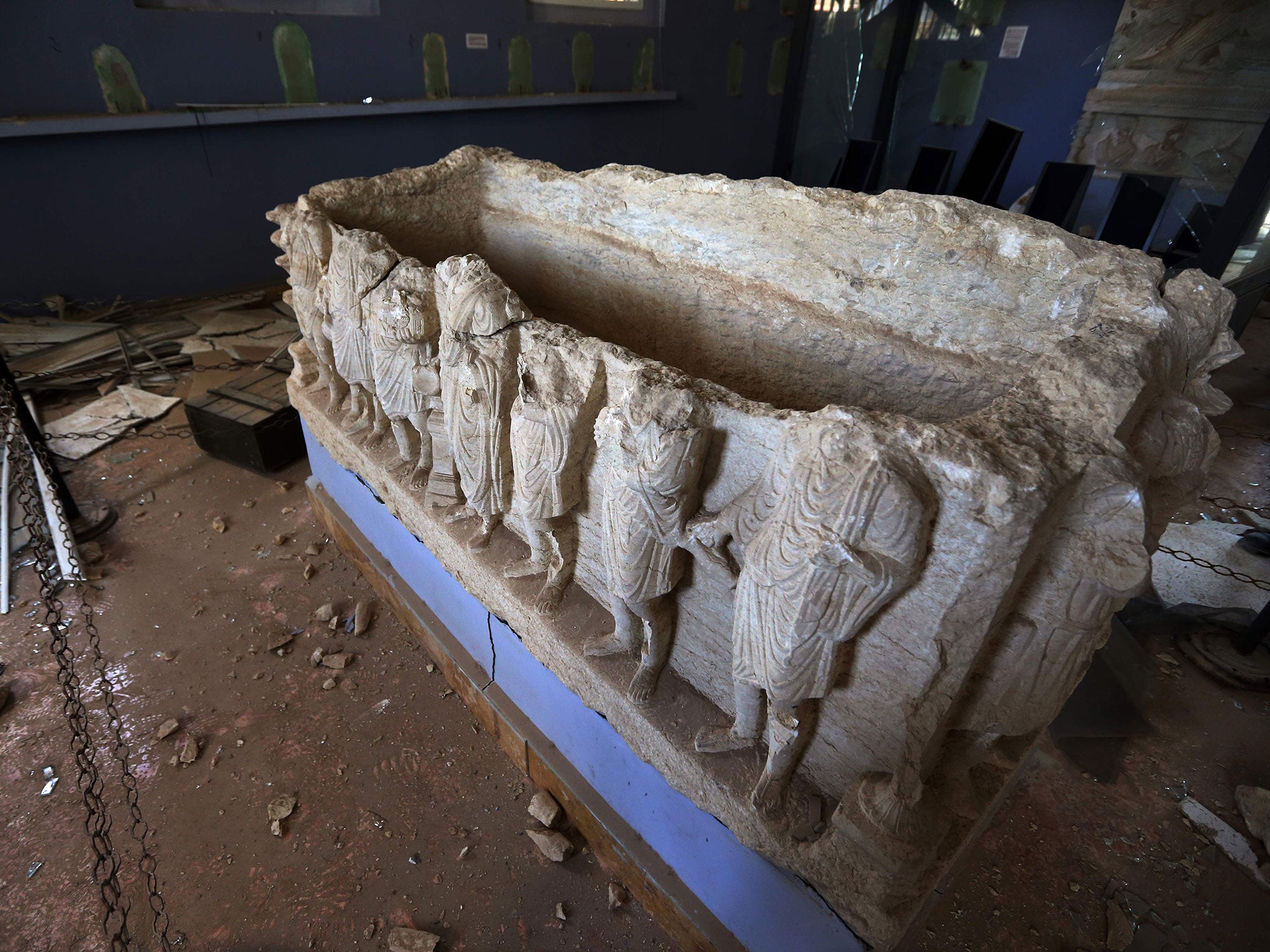 An ancient tomb has been defaced and lies in the wreckage of the Palmyra museum. (JOSEPH EID/AFP/Getty Images )