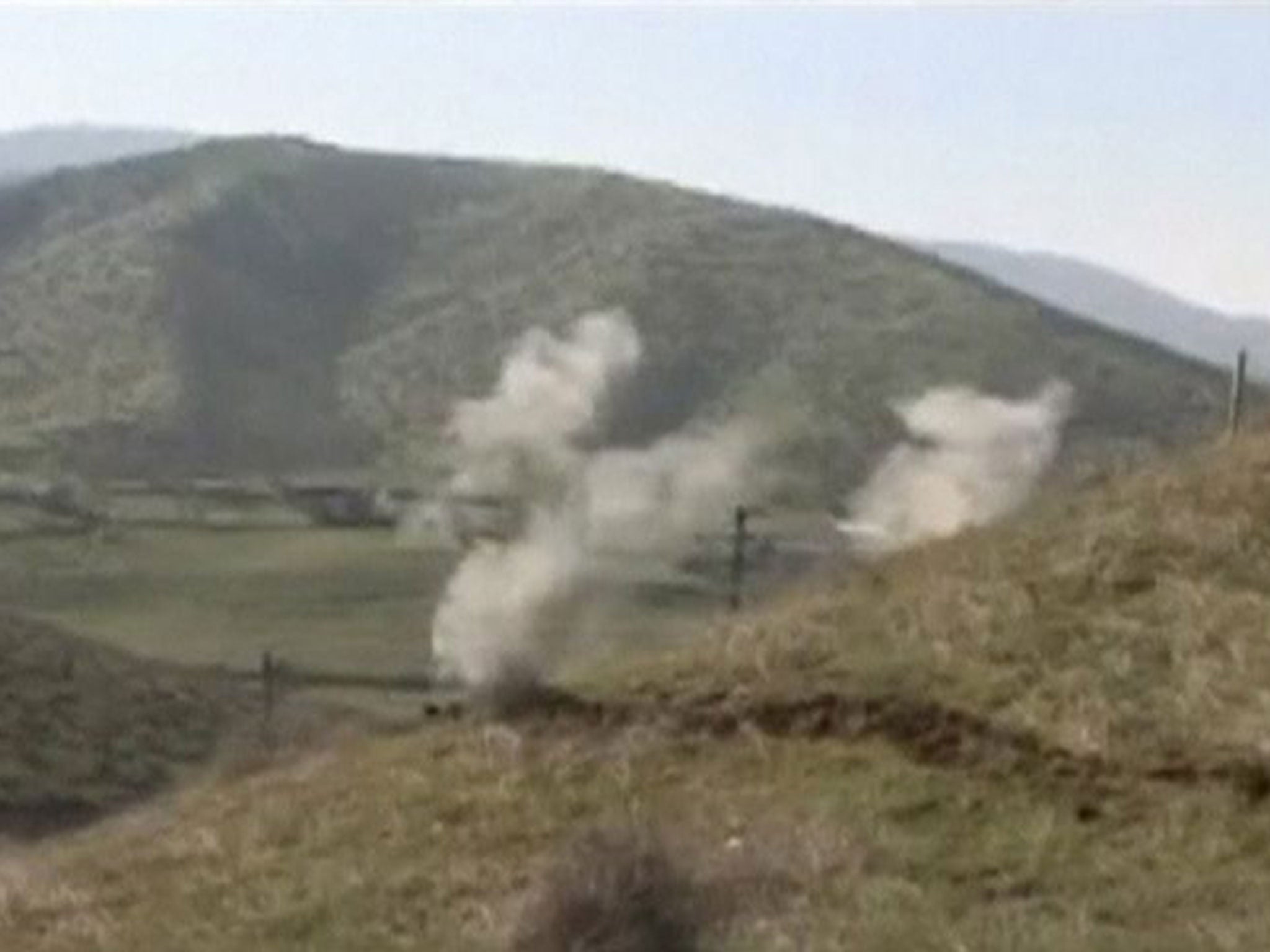 Smoke rises after clashes between Armenian and Azeri forces in Nagorno-Karabakh region