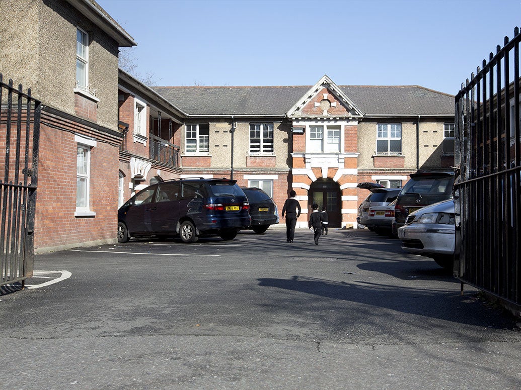 Ultra-Orthodox Jewish children seen arriving at a building in Stamford Hill