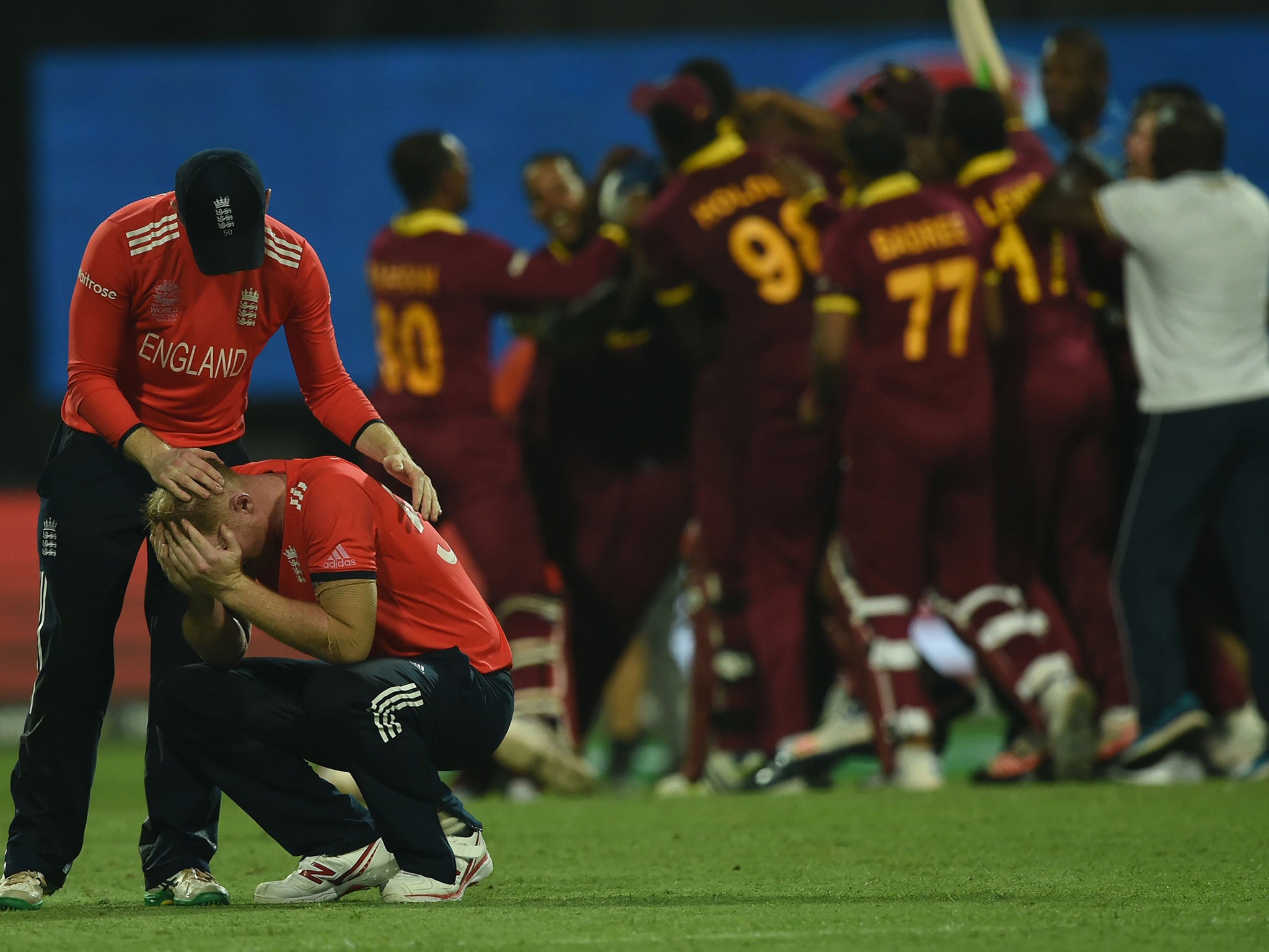 Ben Stokes is consoled by captain Eoin Morgan