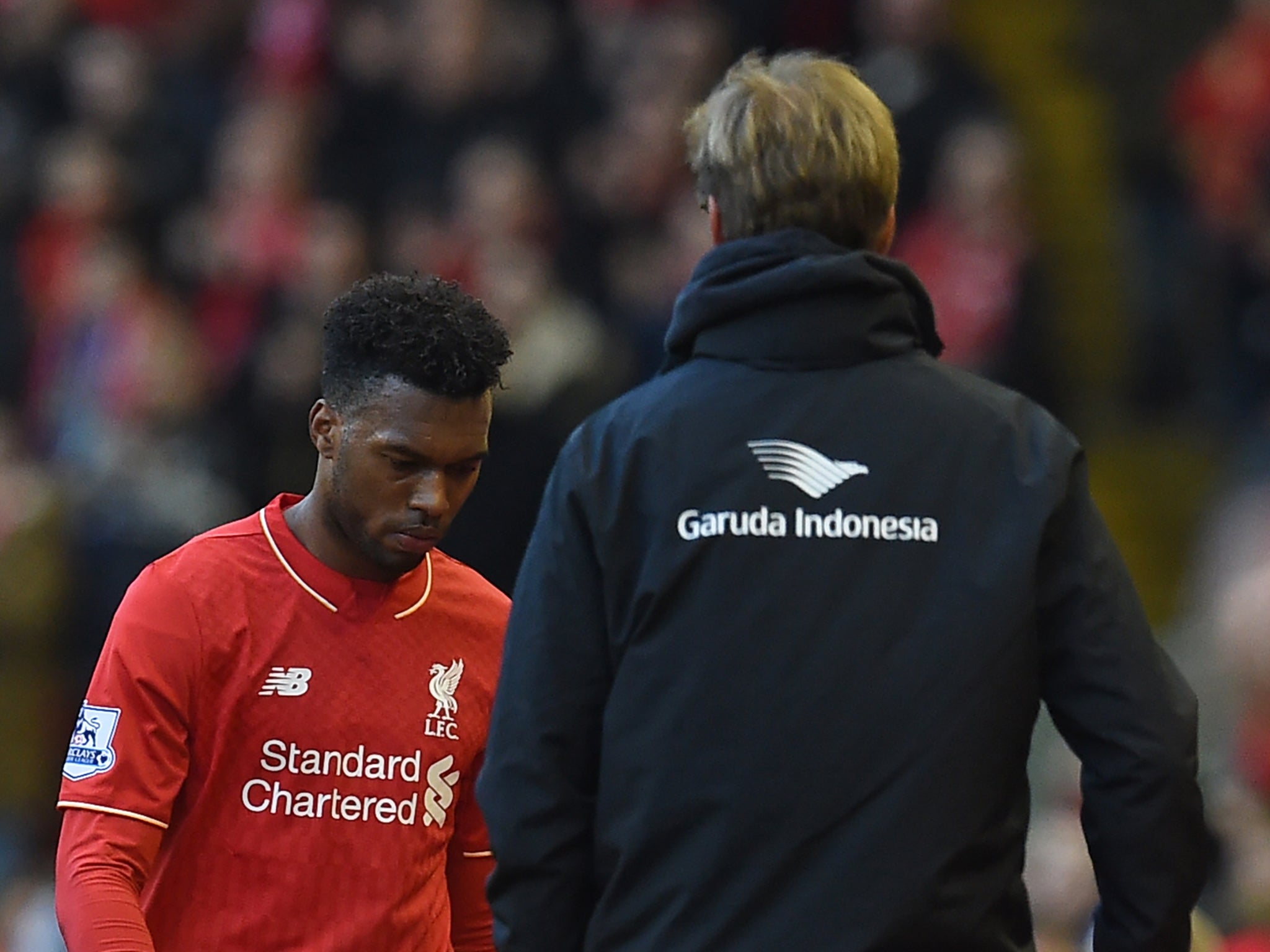 Liverpool striker Daniel Sturridge walks off the field