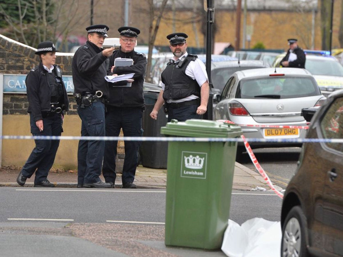 Police at the scene of a stabbing in Lewisham in south London