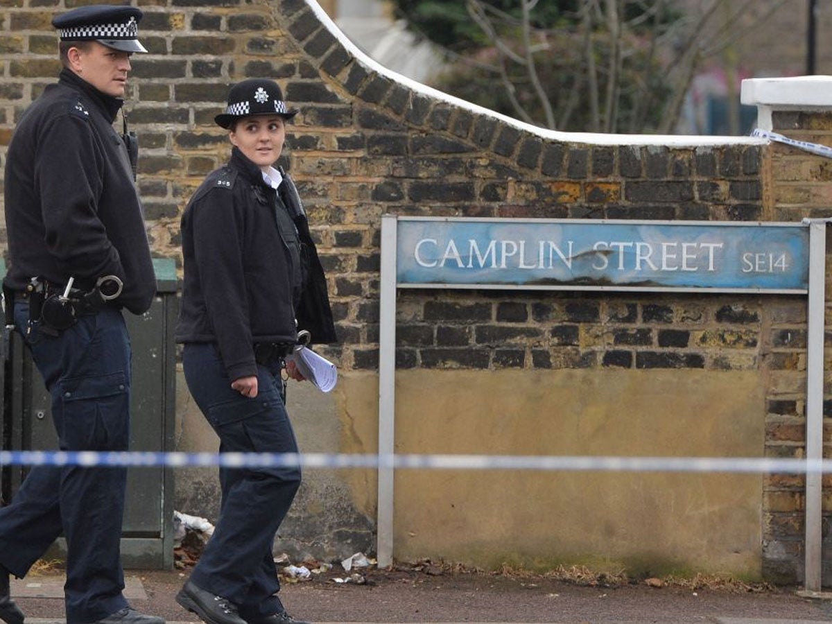 Police at the scene of a stabbing in Lewisham in south London