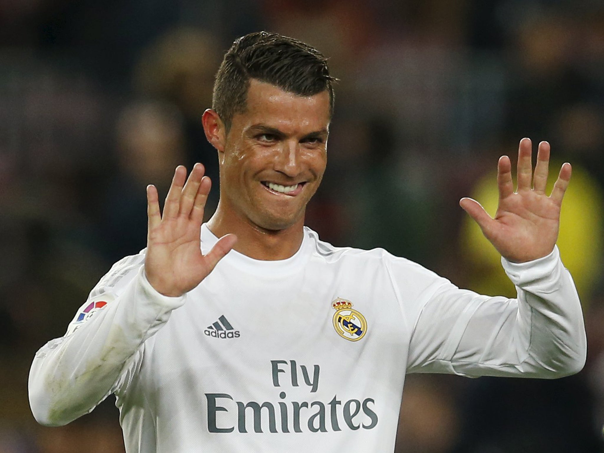 Real Madrid's Cristiano Ronaldo celebrates after the game between FC Barcelona and Real Madrid ()