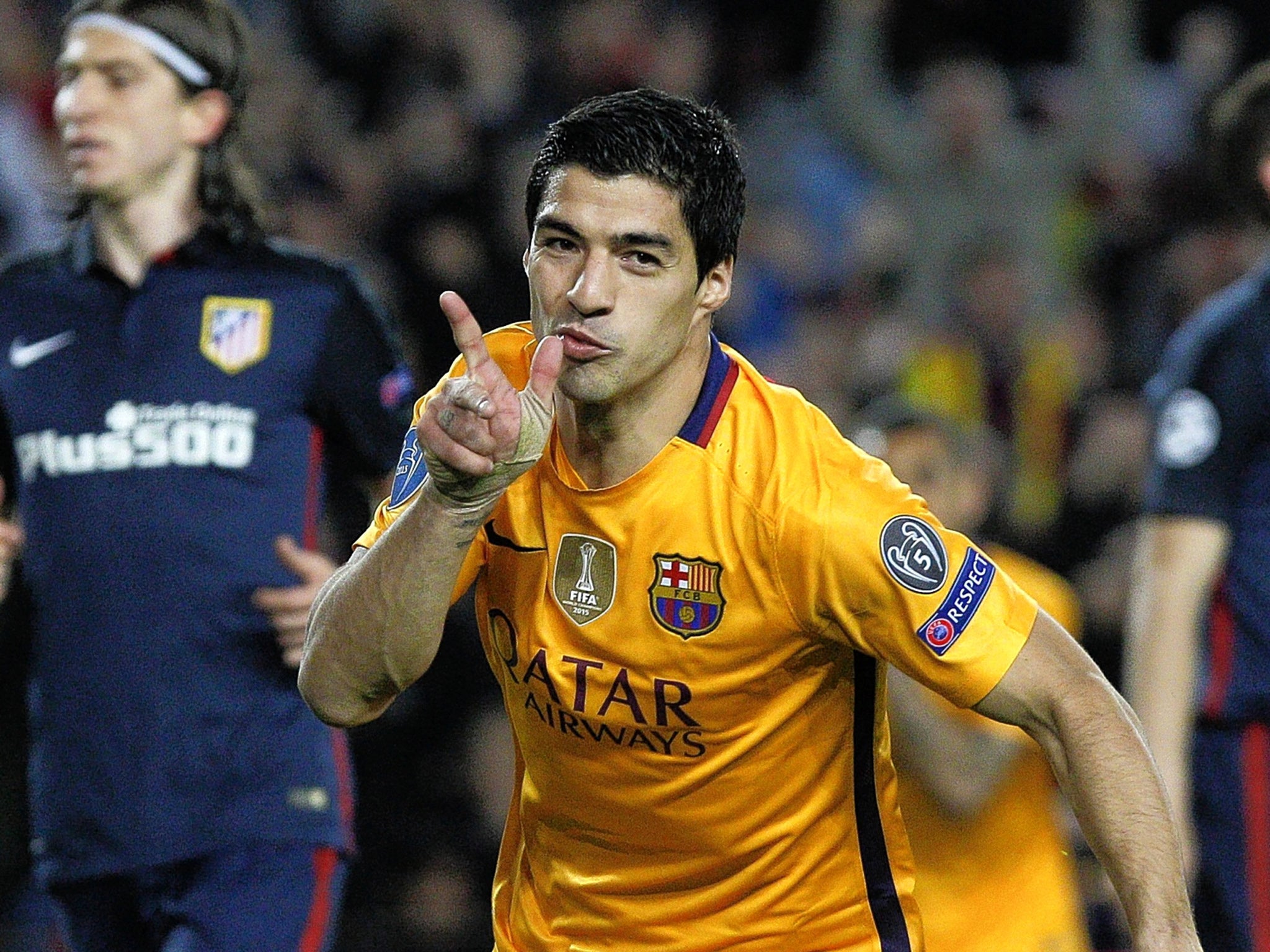 Luis Suarez celebrates his second goal for Barcelona