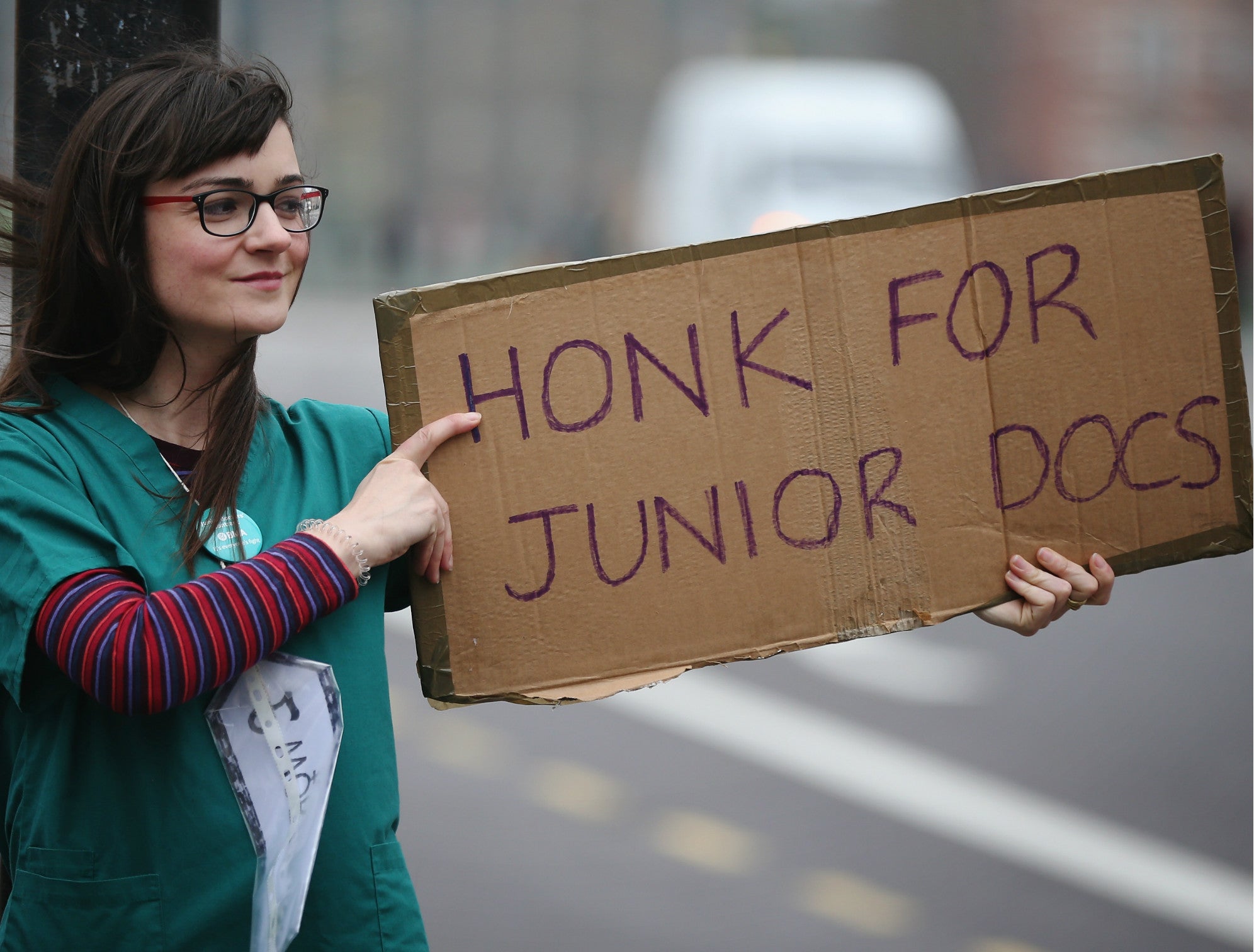 Junior doctors and staff members take part in a strike outside St Thomas' Hospital on April 6, 2016 in London, England. Getty