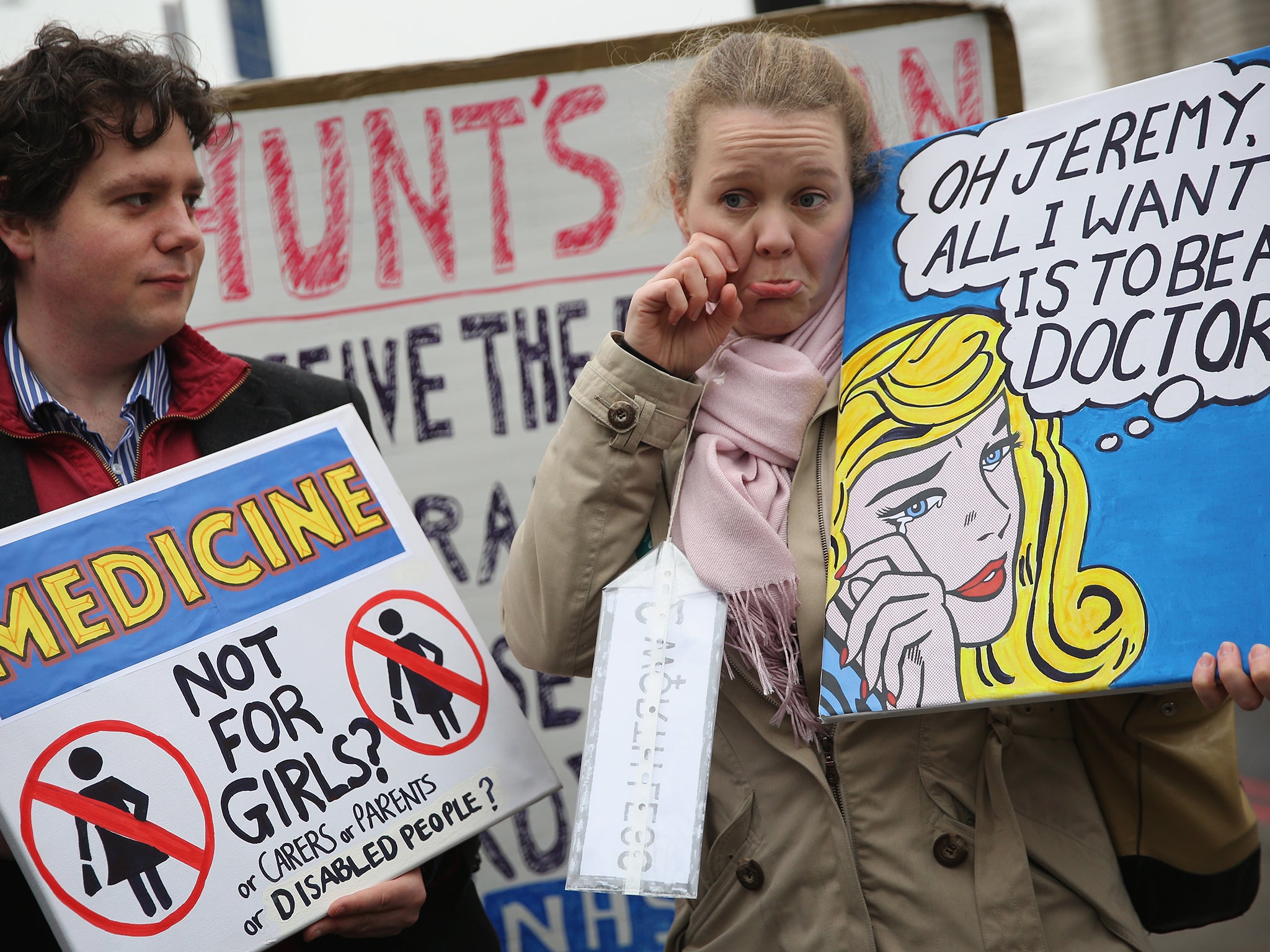 Junior doctors and staff members take part in a strike outside St Thomas' Hospital in London. Junior doctors in England are currently taking part in a 48 hour strike, their fourth in their long-running dispute with the government over contract changes