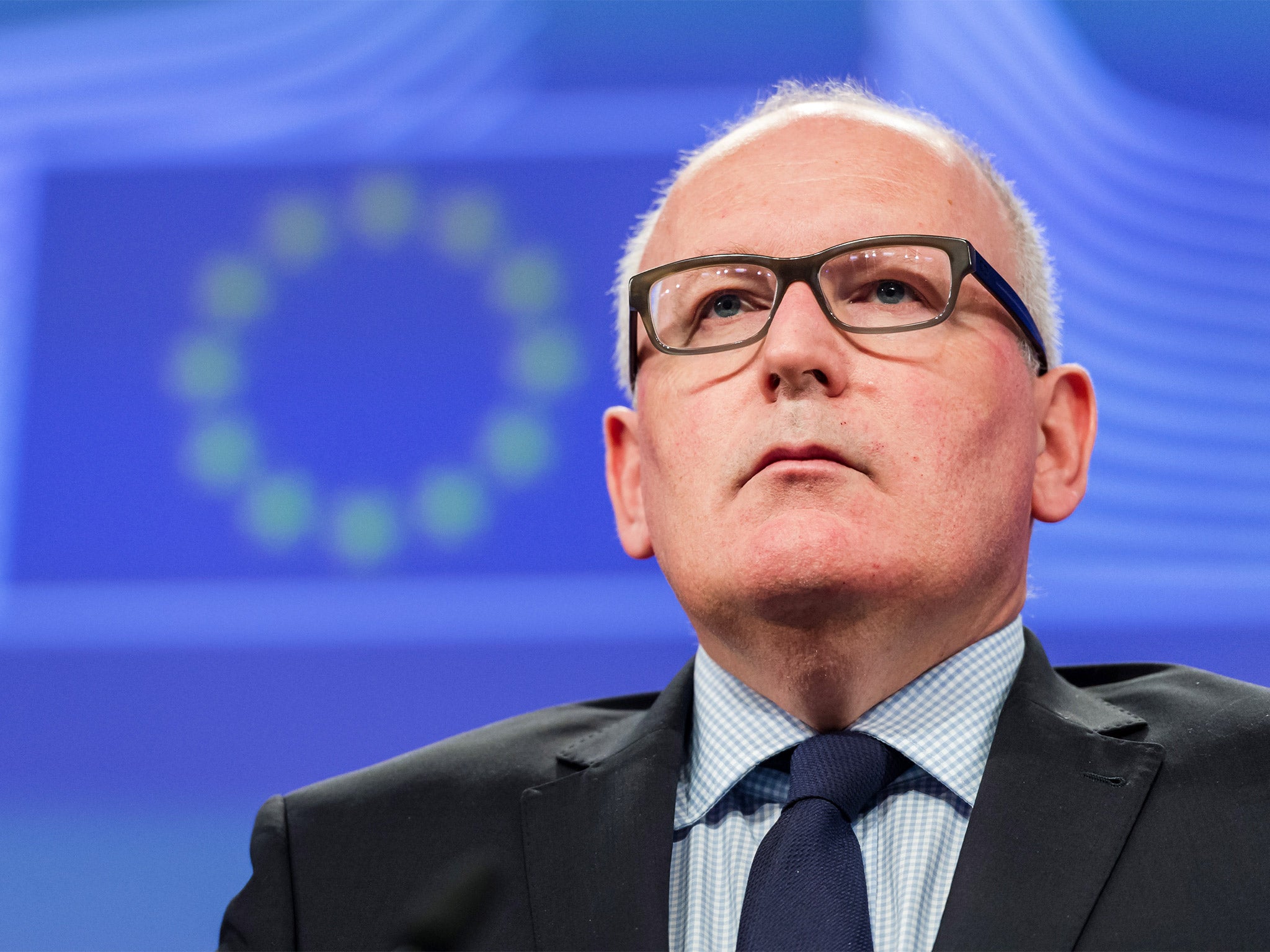 EU Commission Vice President Frans Timmermans addresses the media in Brussels