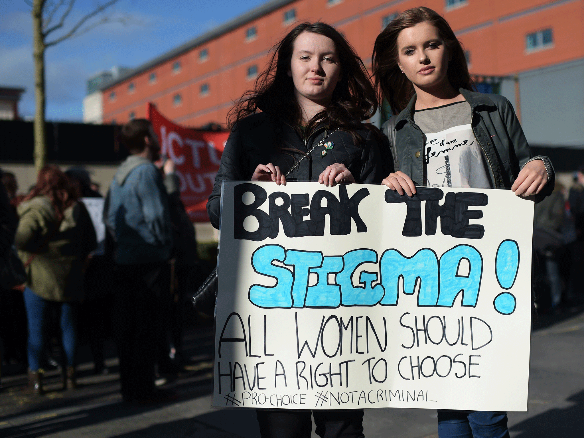 Protesters carry a banner outside Belfast's Public Prosecution this week stating 'Break the stigma, all women should have a right to choose'