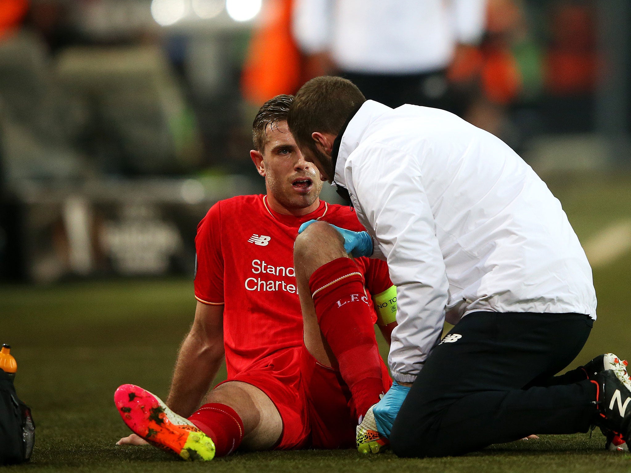 Jordan Henderson following his knee injury in Dortmund