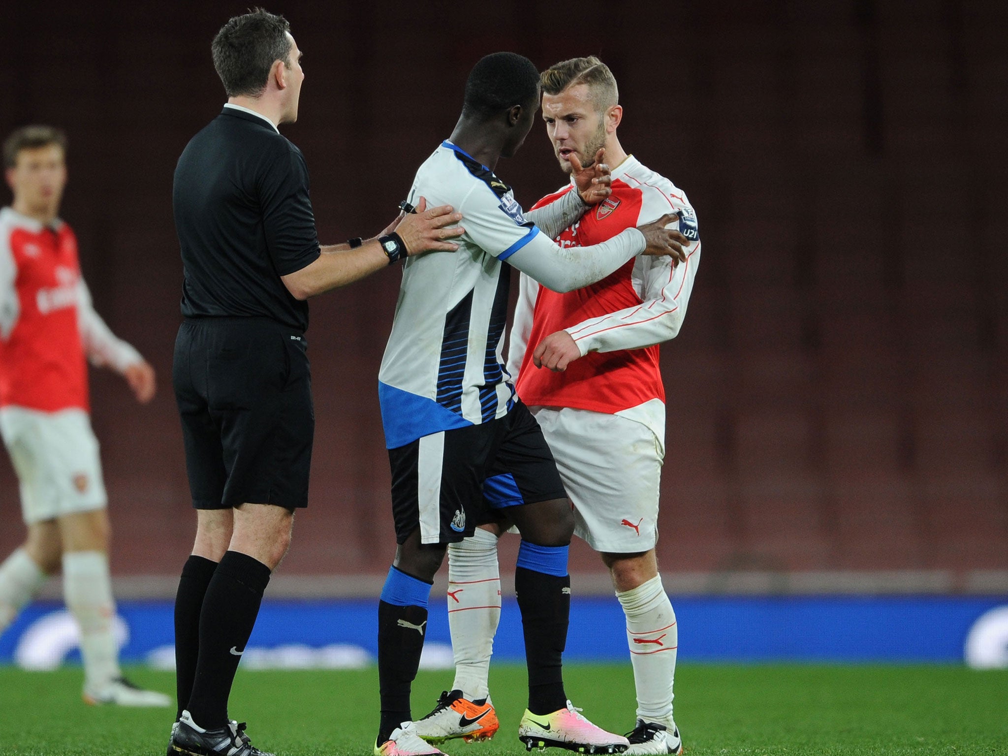 Henri Saivet and Jack Wilshere have words