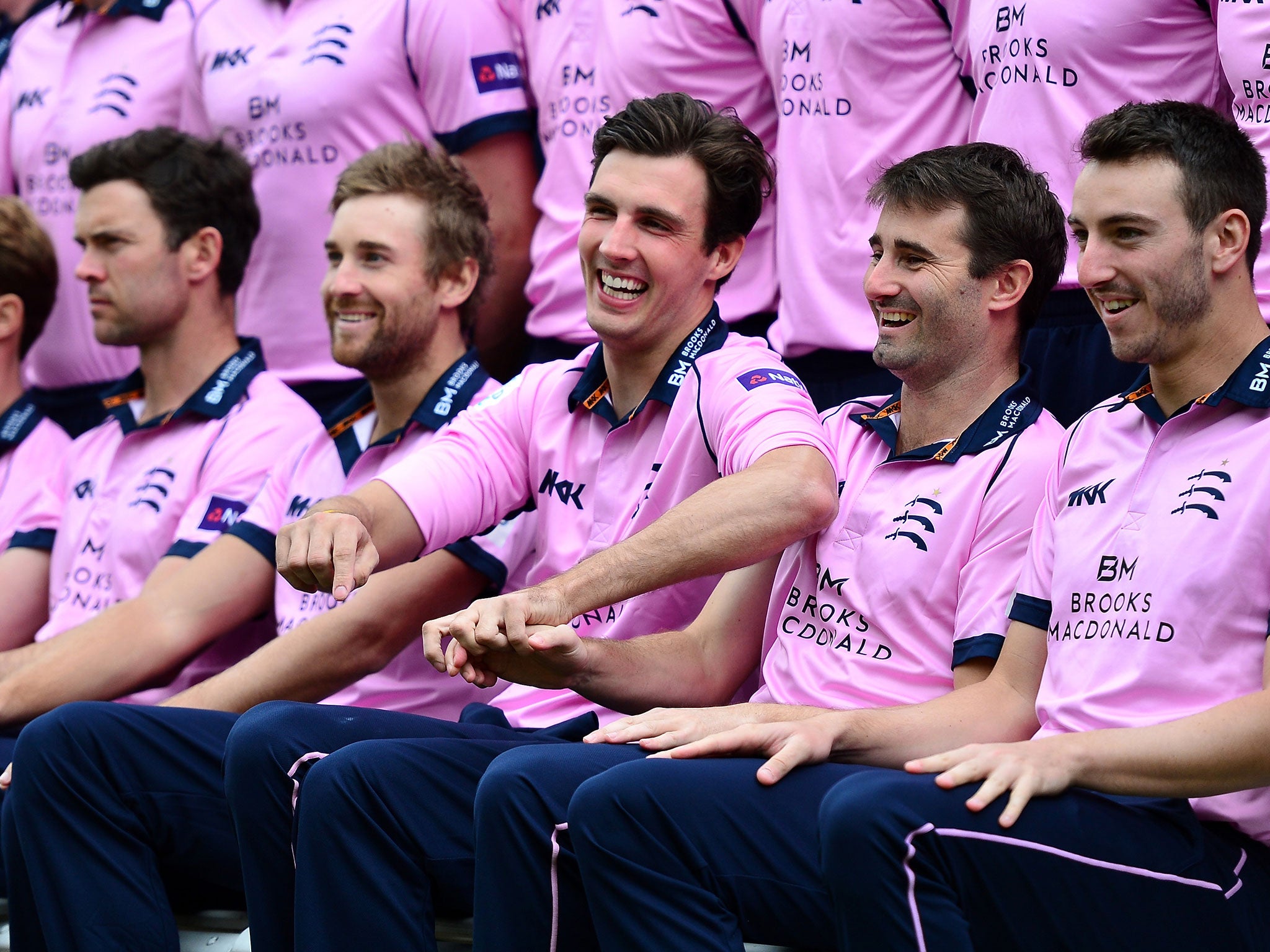 Steven Finn of Middlesex shares a joke