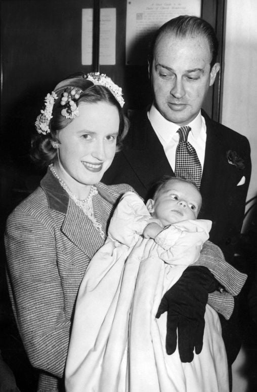 &#13;
Jane and Gavin Welby with their newly christened son Justin in 1956 &#13;