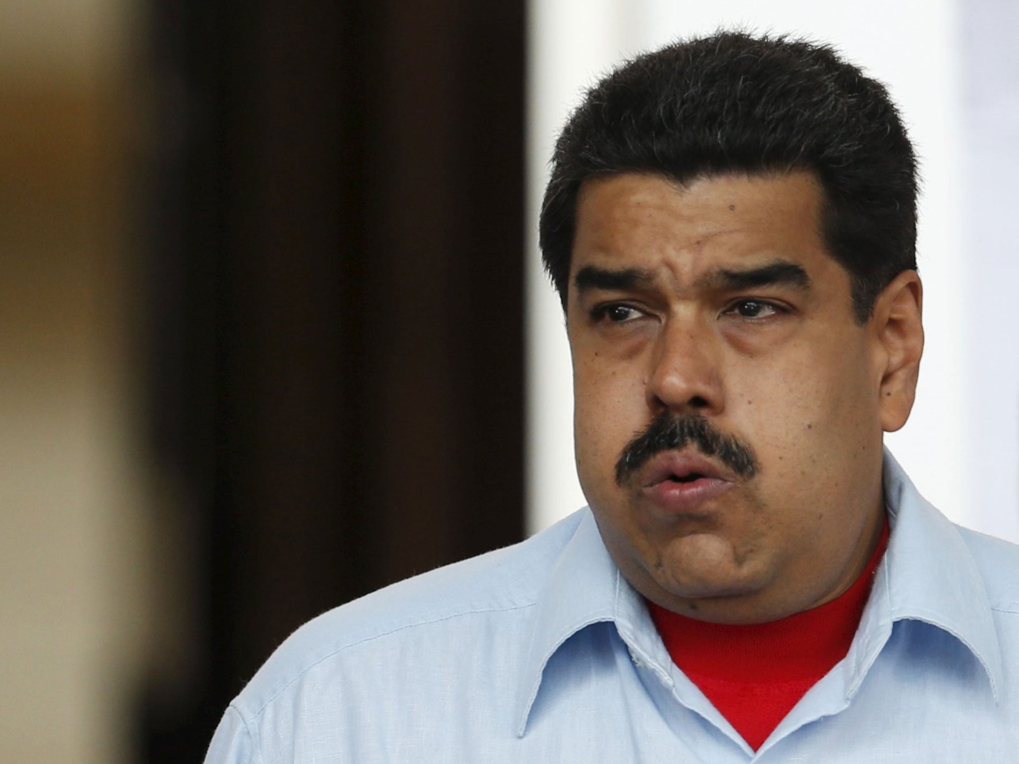 Venezuela's President Nicolas Maduro gestures while he attends to a rally in Caracas, April 7, 2016.