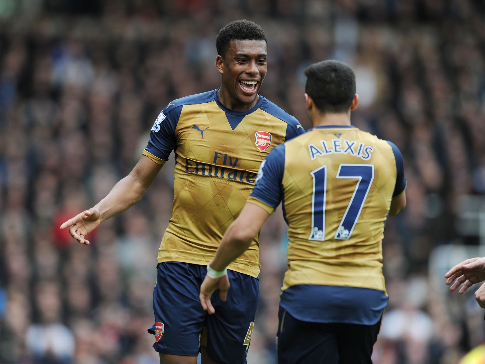 Iwobi celebrates Arsenal's second with Alexis Sanchez