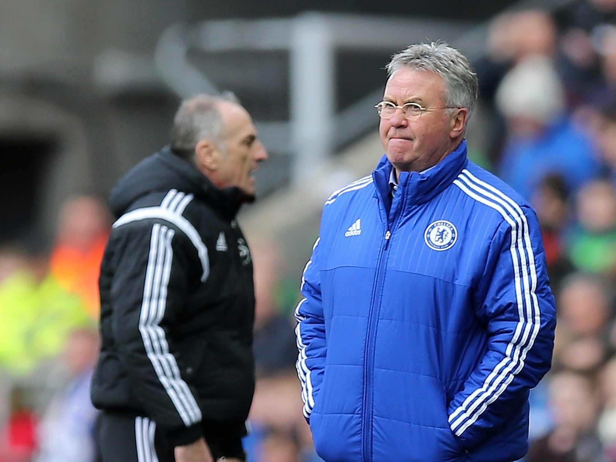 Chelsea interim manager Guus Hiddink watches on at the Liberty Stadium